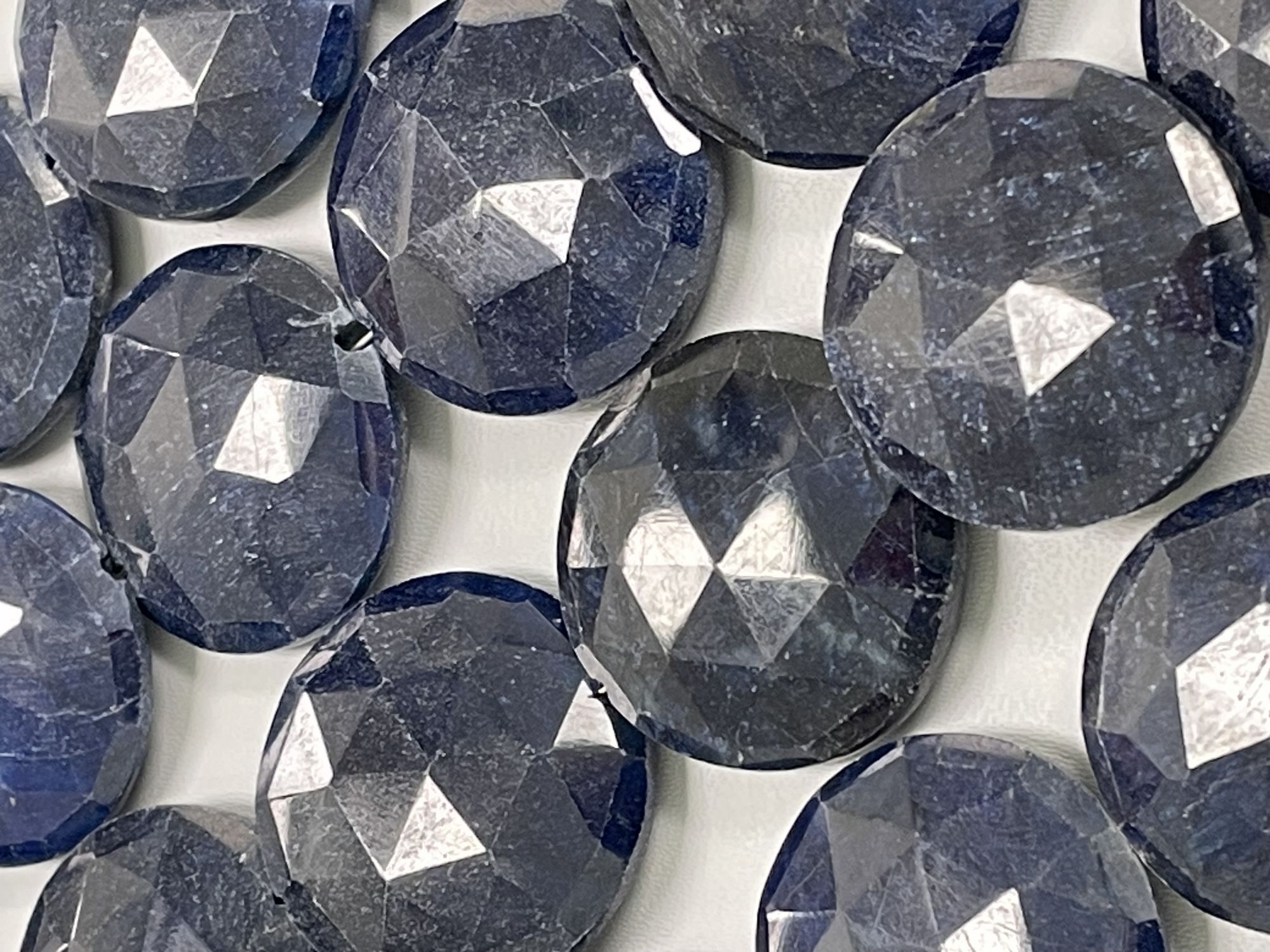 Oiled Blue Sapphire Coin Faceted