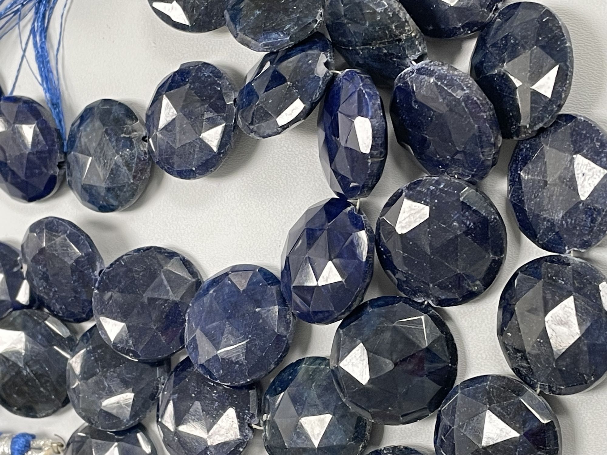 Oiled Blue Sapphire Coin Faceted
