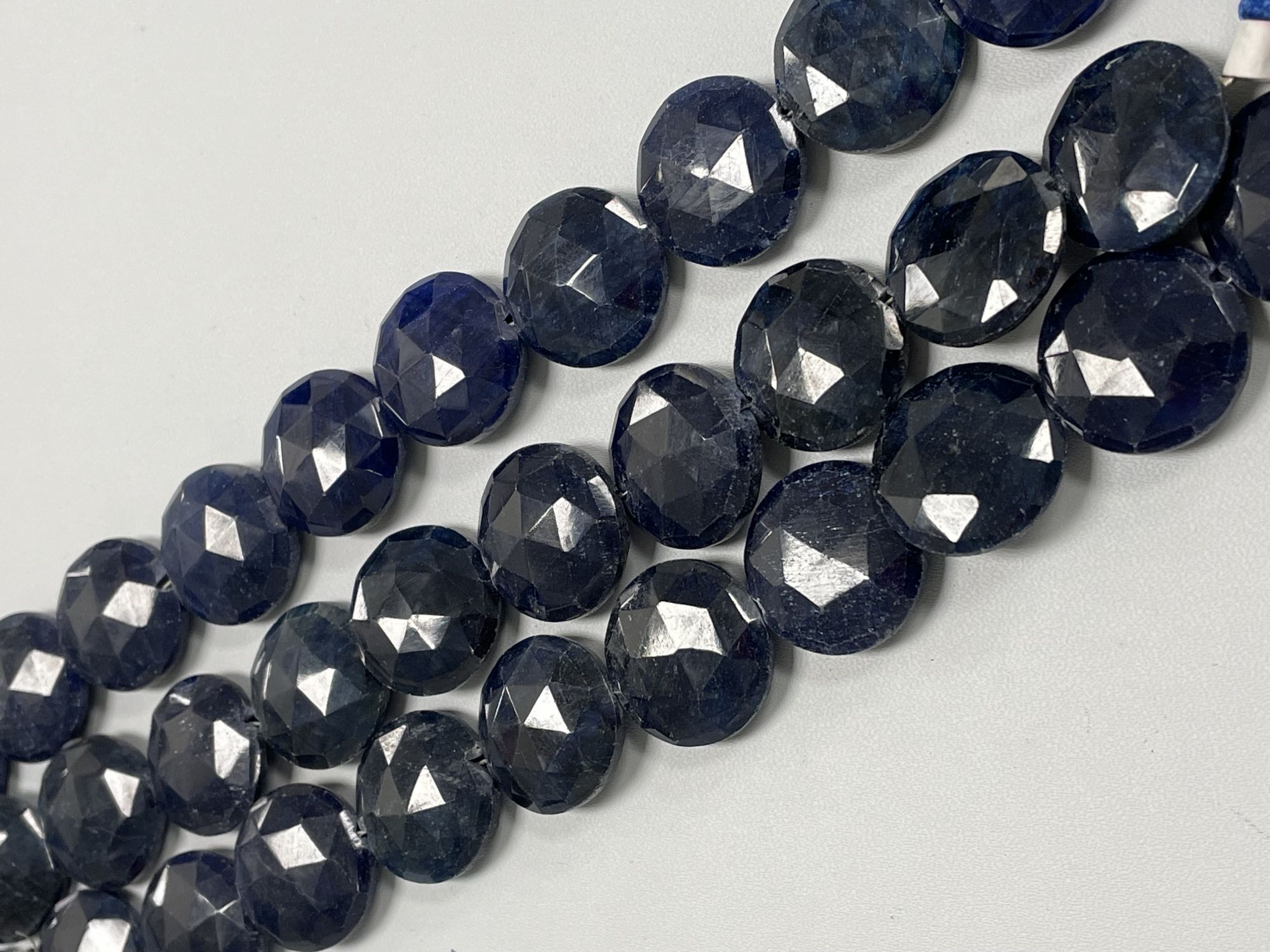 Oiled Blue Sapphire Coin Faceted