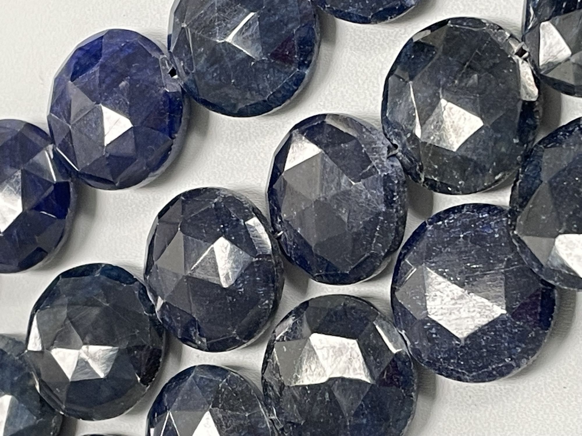 Oiled Blue Sapphire Coin Faceted