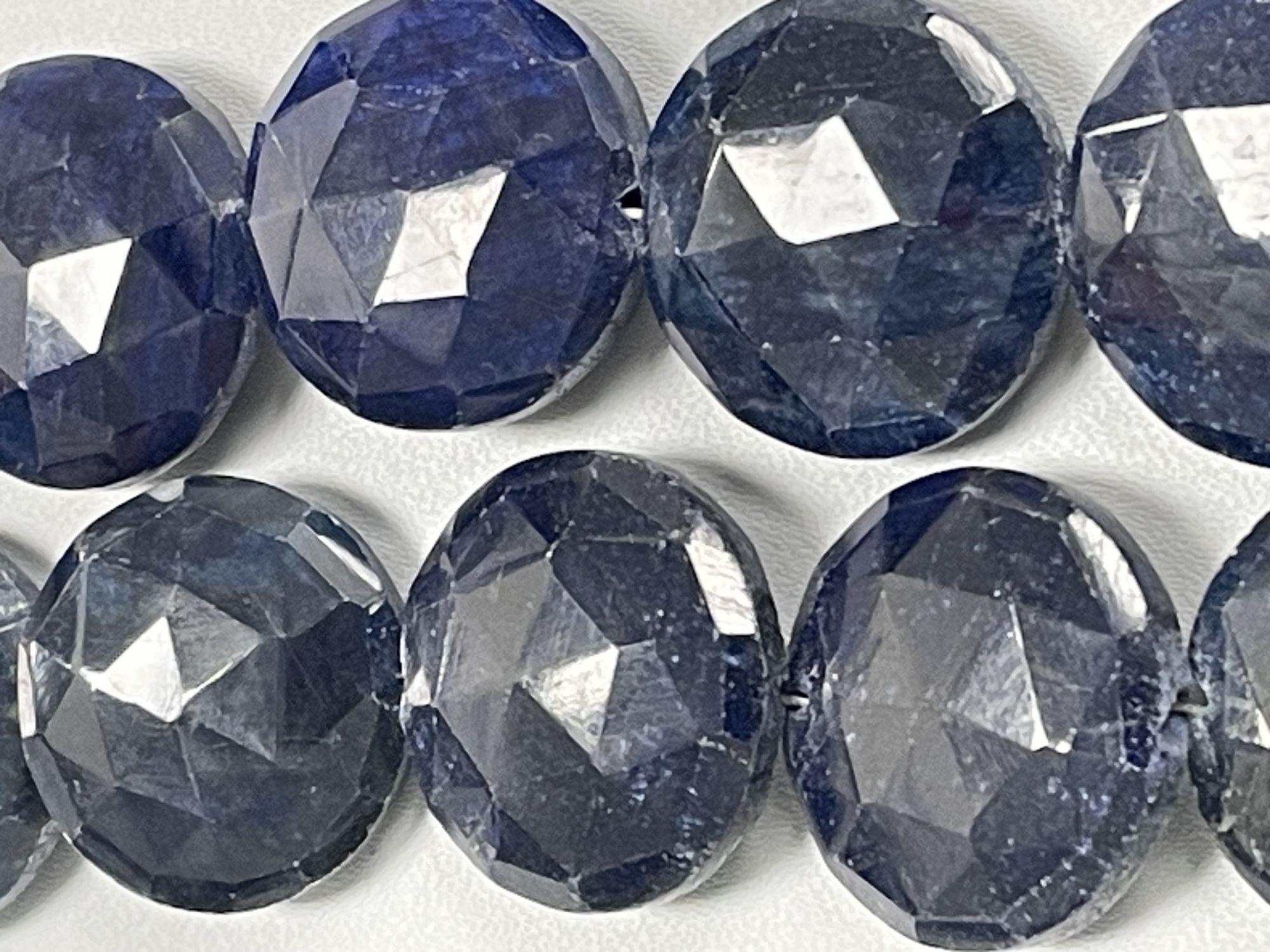 Oiled Blue Sapphire Coin Faceted