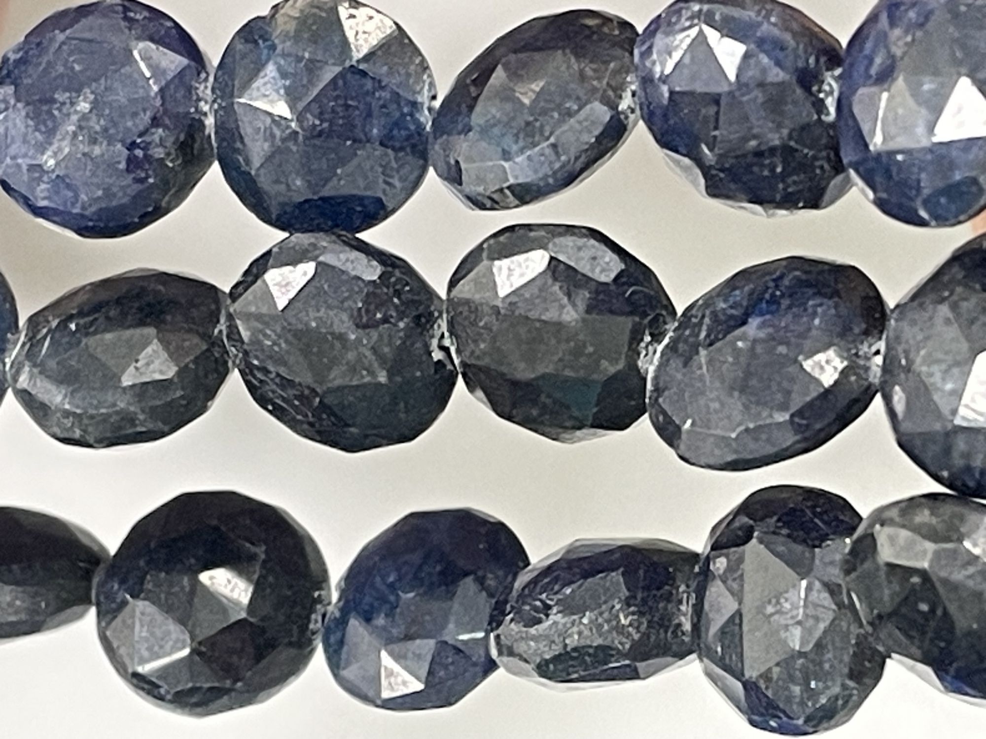 Oiled Blue Sapphire Coin Faceted