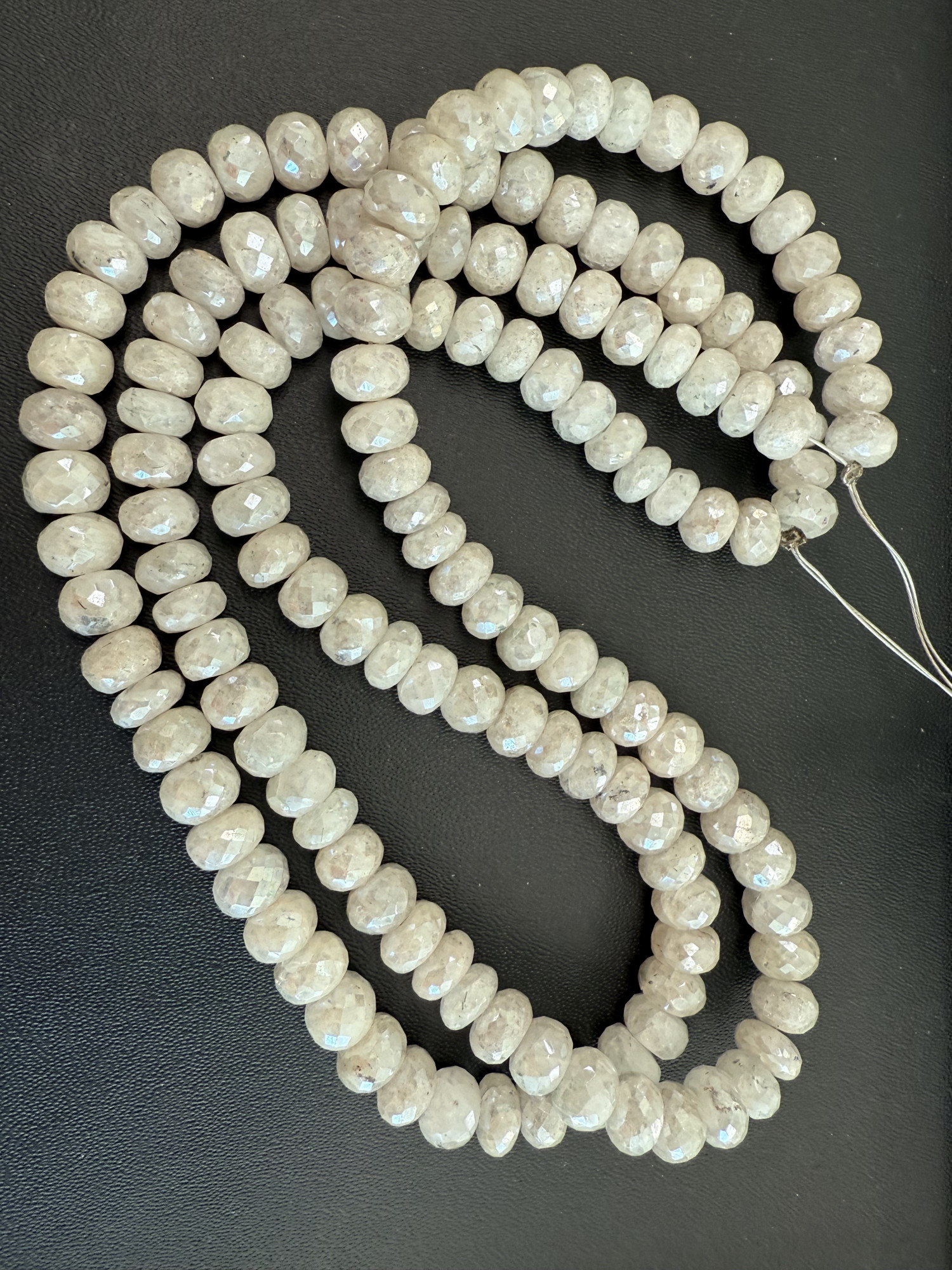 Coated Graptolite Rondelle faceted