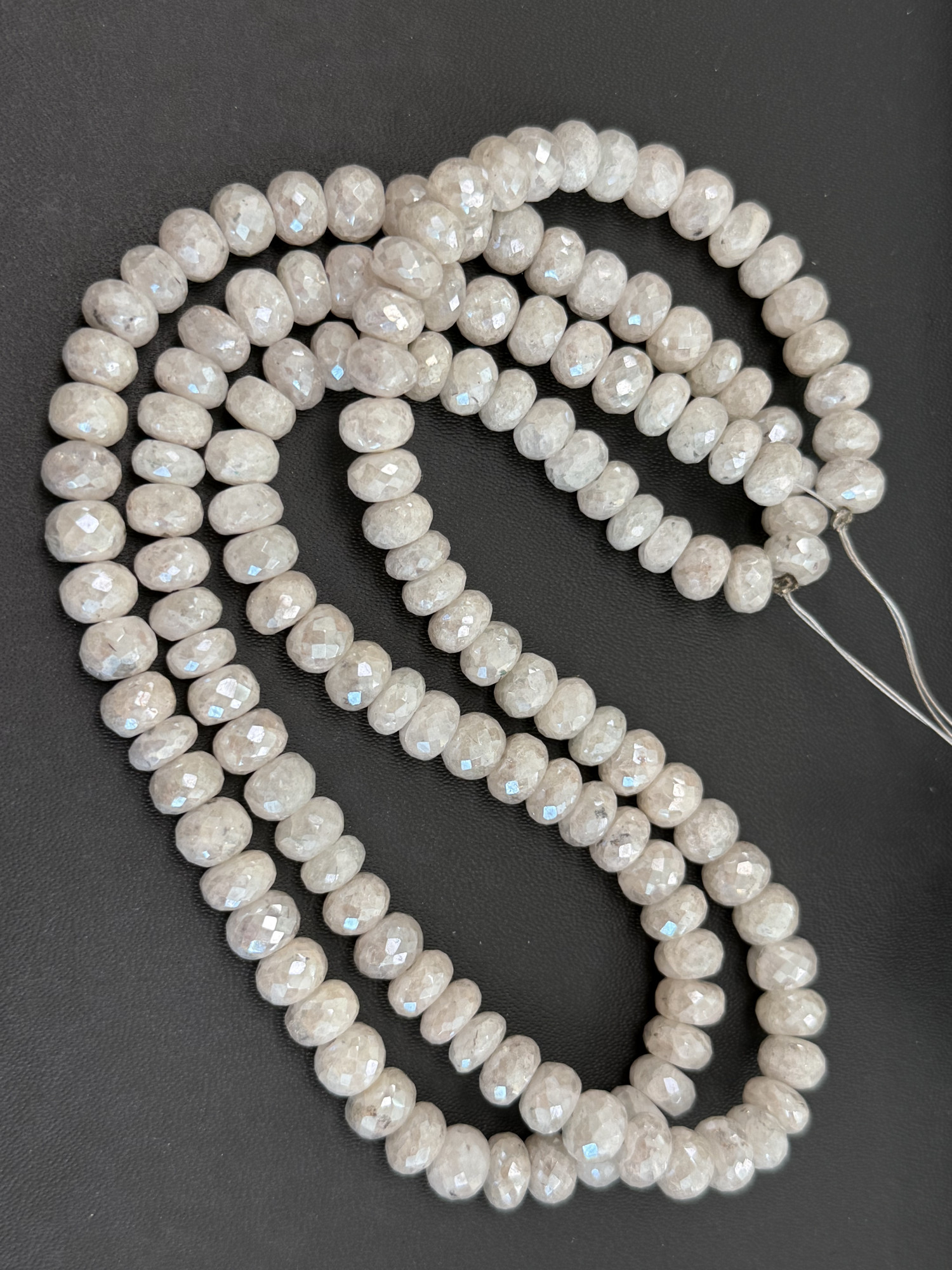 Coated Graptolite Rondelle faceted