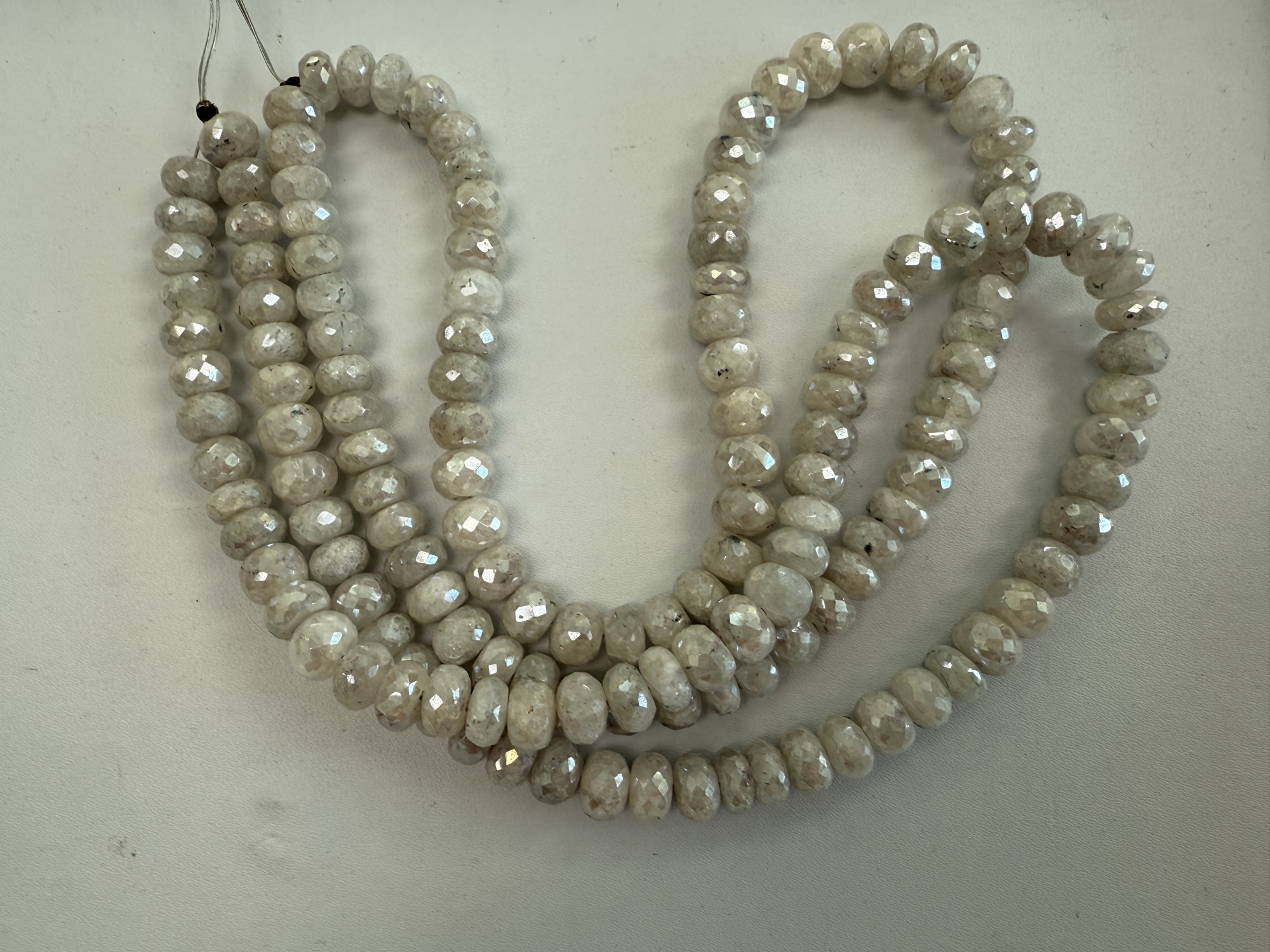 Coated Graptolite Rondelle faceted