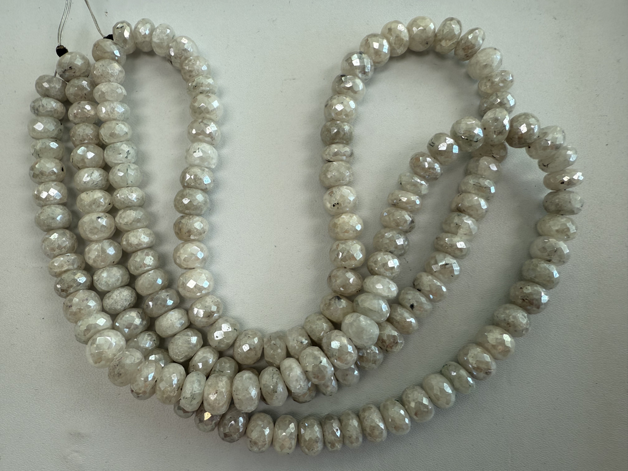 Coated Graptolite Rondelle faceted