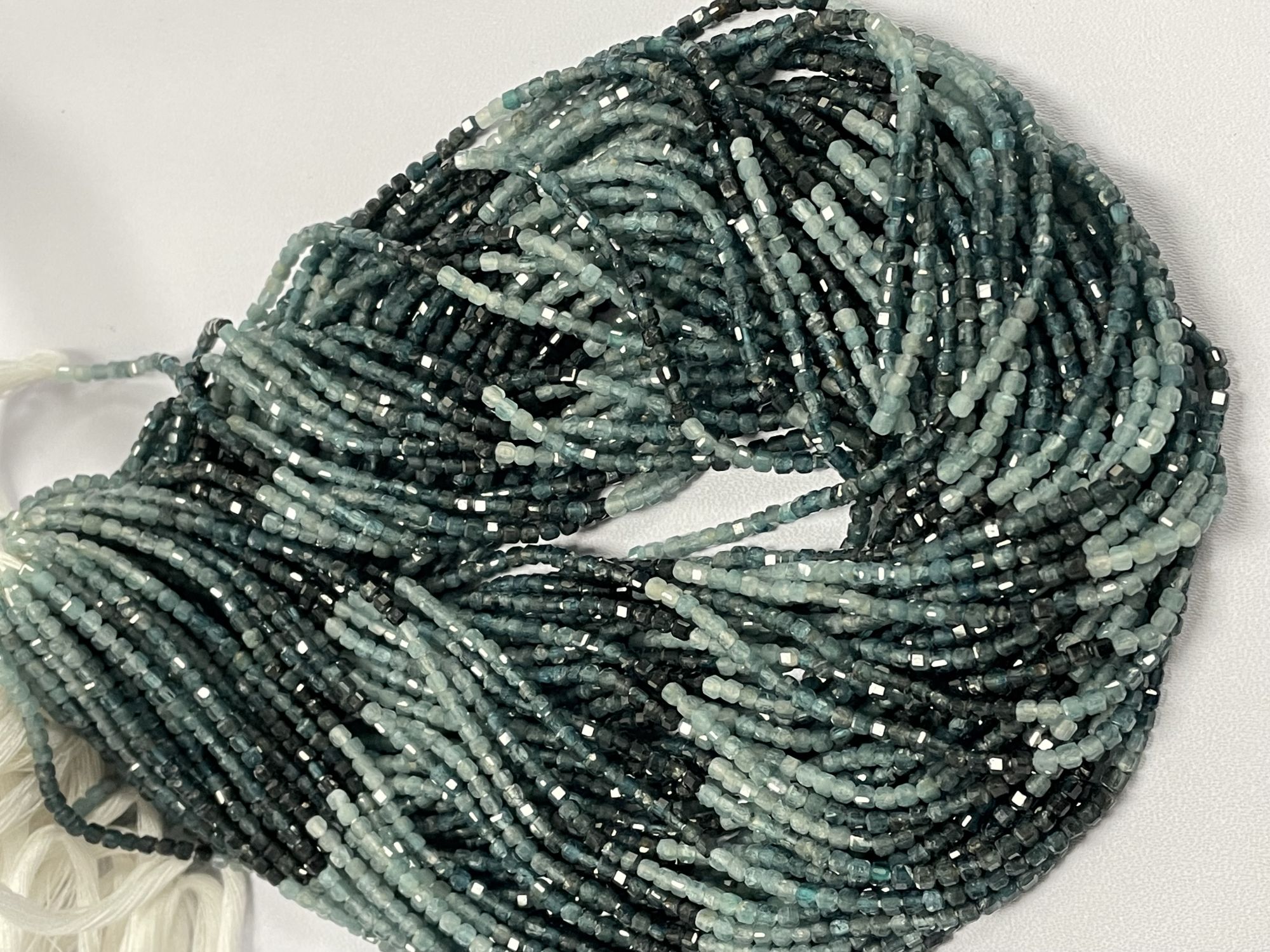 Shaded Grey Grandidierite Cube Faceted