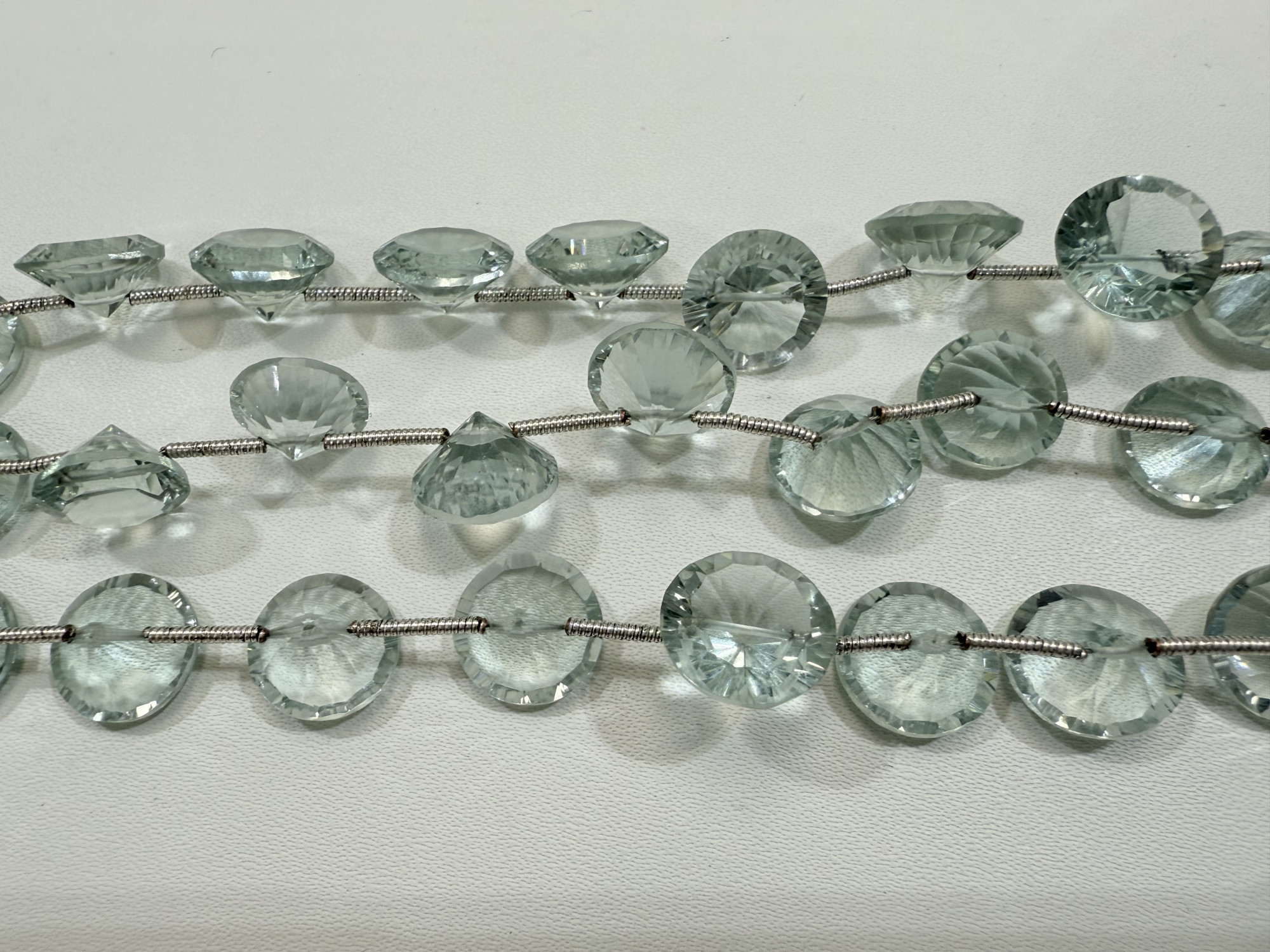 Aqua Hydro Quartz Cones Faceted