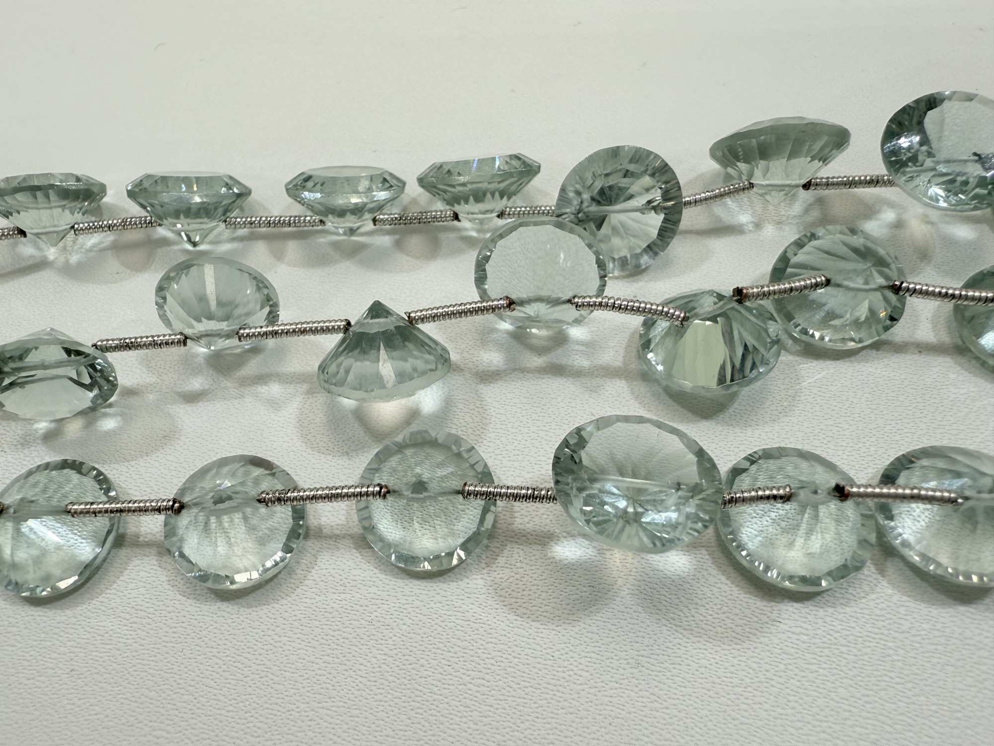 Aqua Hydro Quartz Cones Faceted