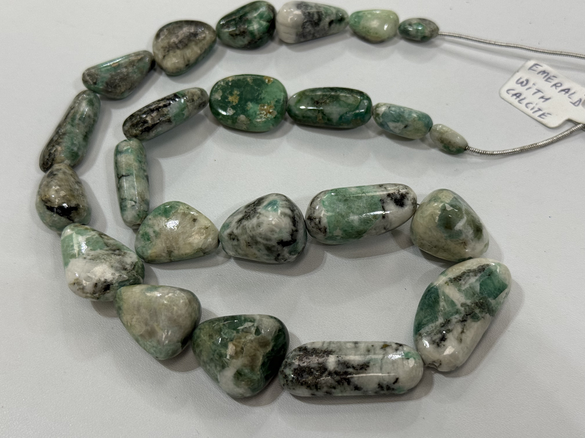 Emerald with Calcite  Nugget Faceted