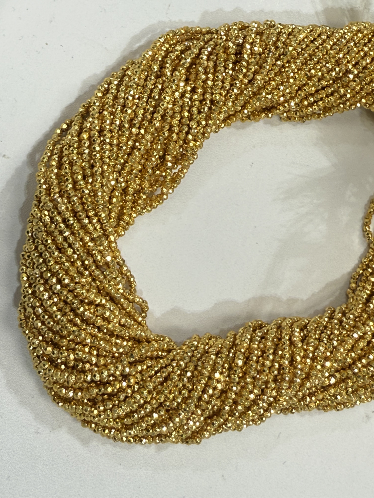 Coated Pyrite Rondelle Faceted