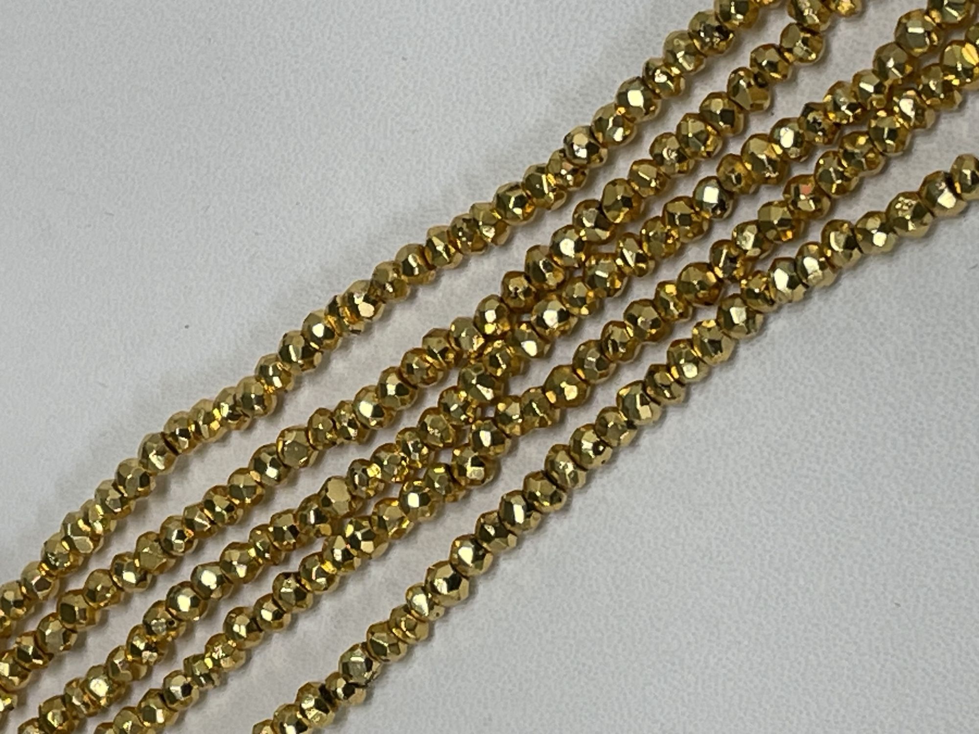 Gold Coated Pyrite Rondelle Faceted