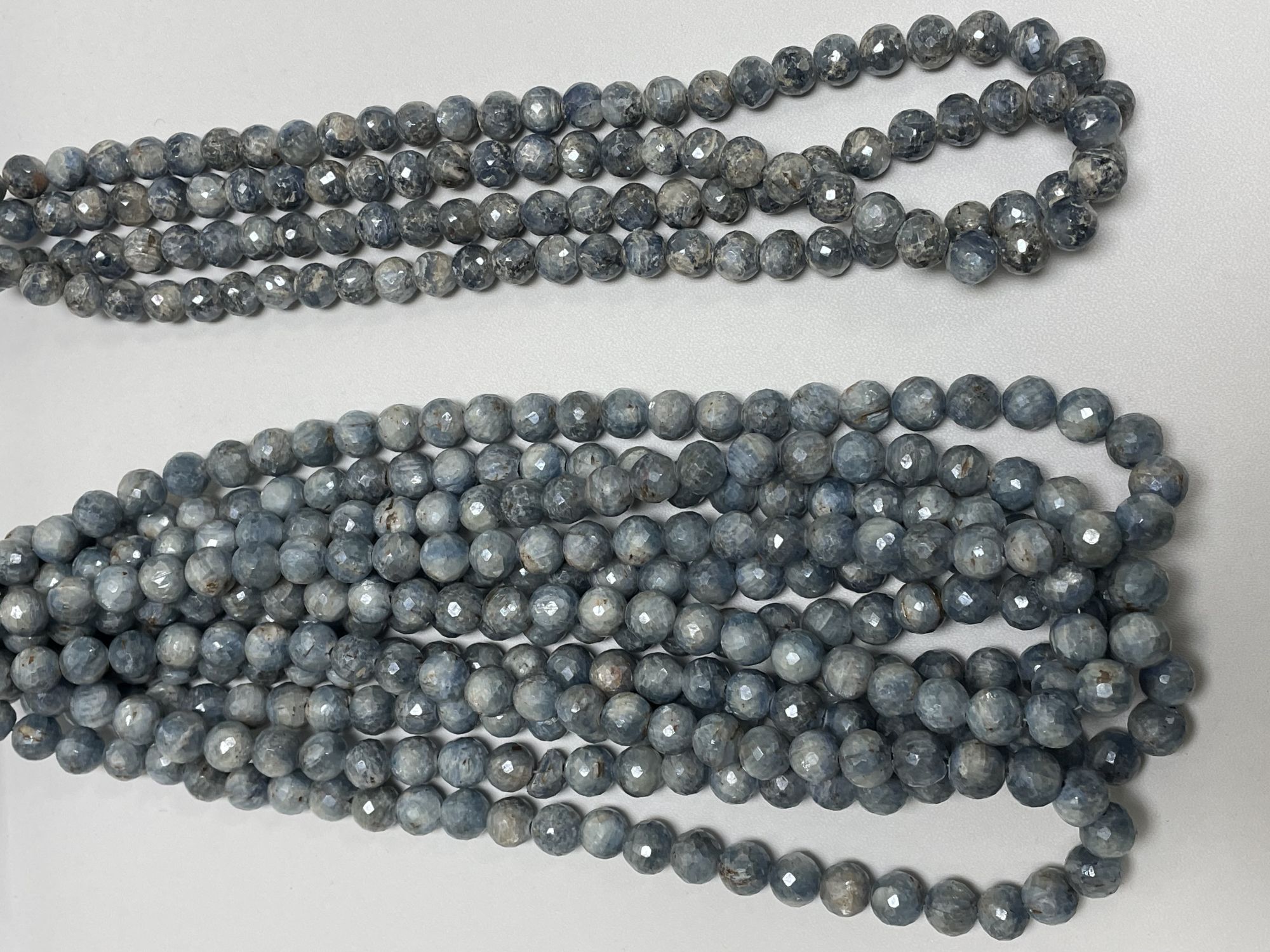 Coated Kyanite Round Faceted