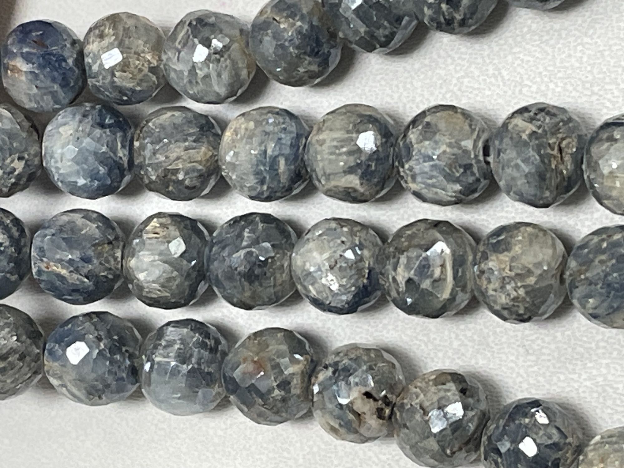 Coated Kyanite Round Faceted