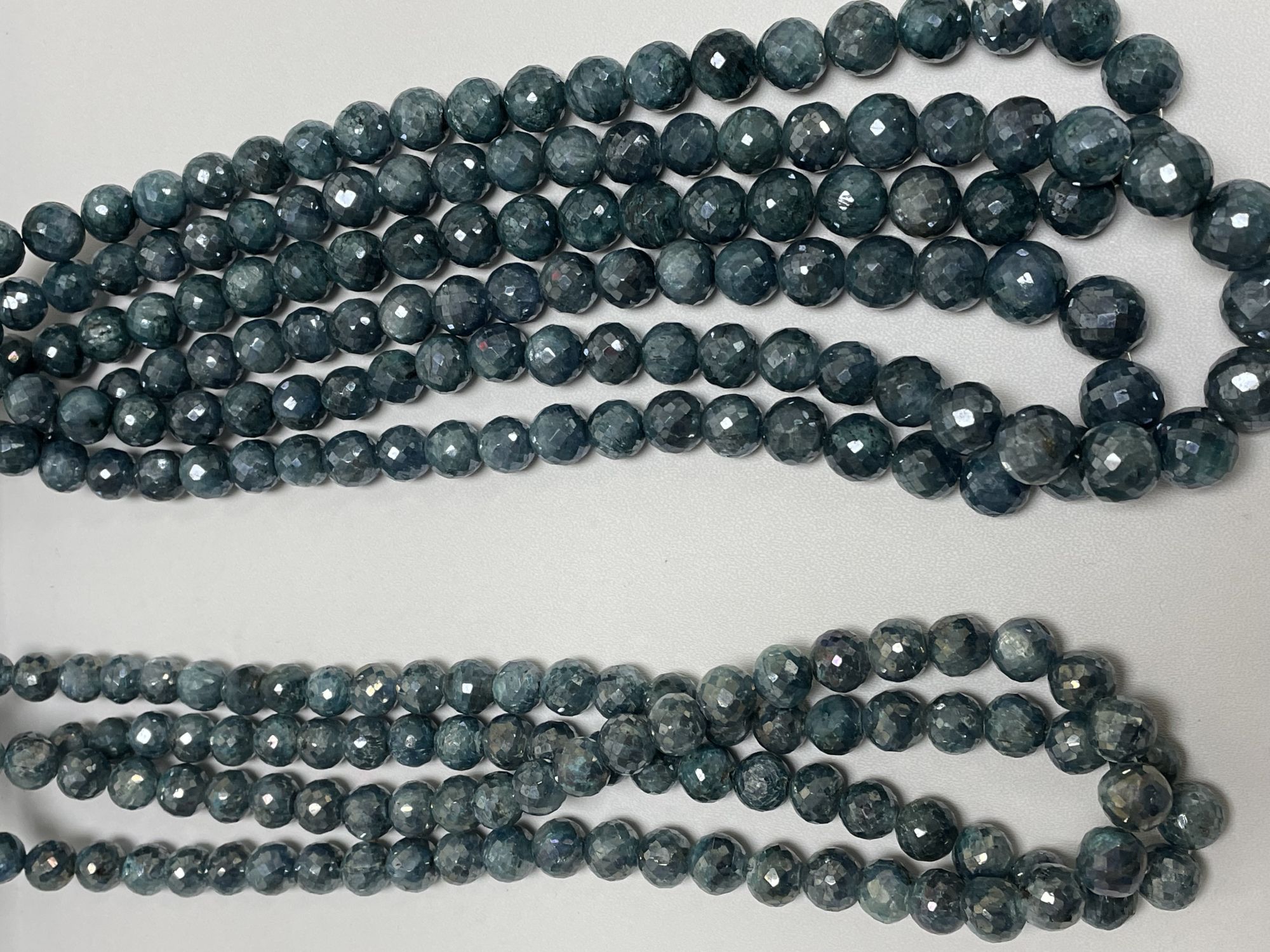 Coated Kyanite Round Faceted