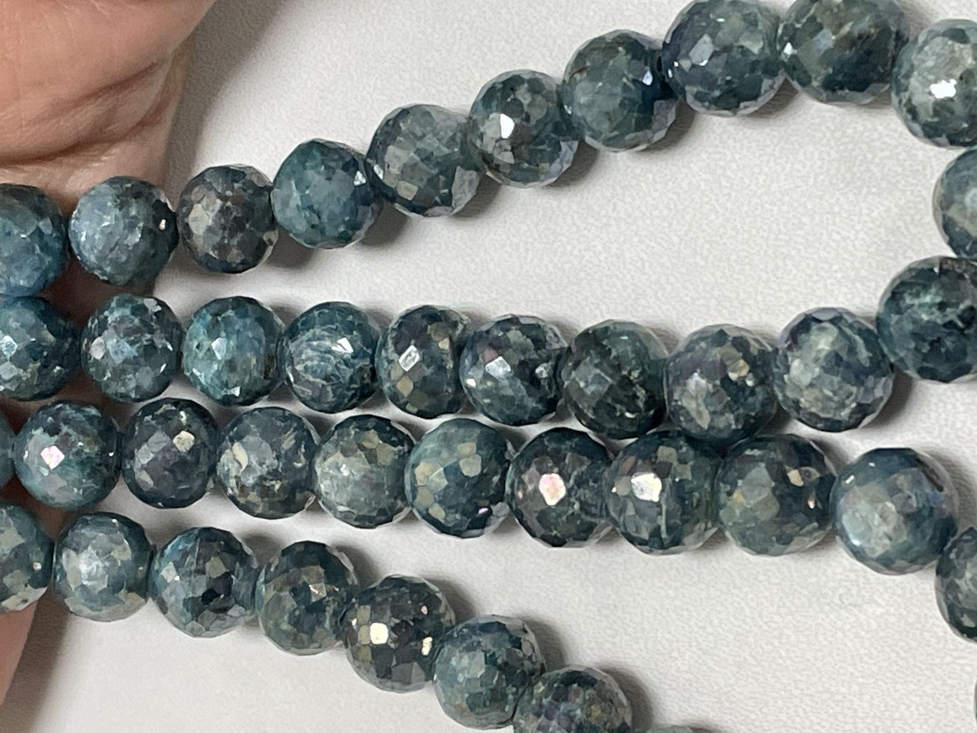 Coated Kyanite Round Faceted