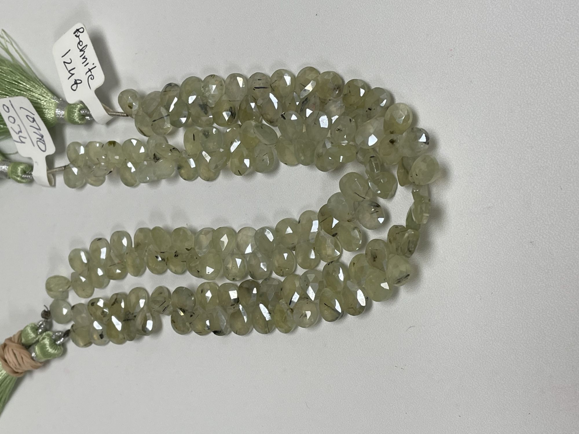 Coated Prehnite Pear Faceted