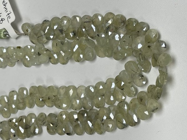Coated Prehnite Pear Faceted