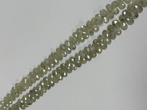 Coated Prehnite Pear Faceted