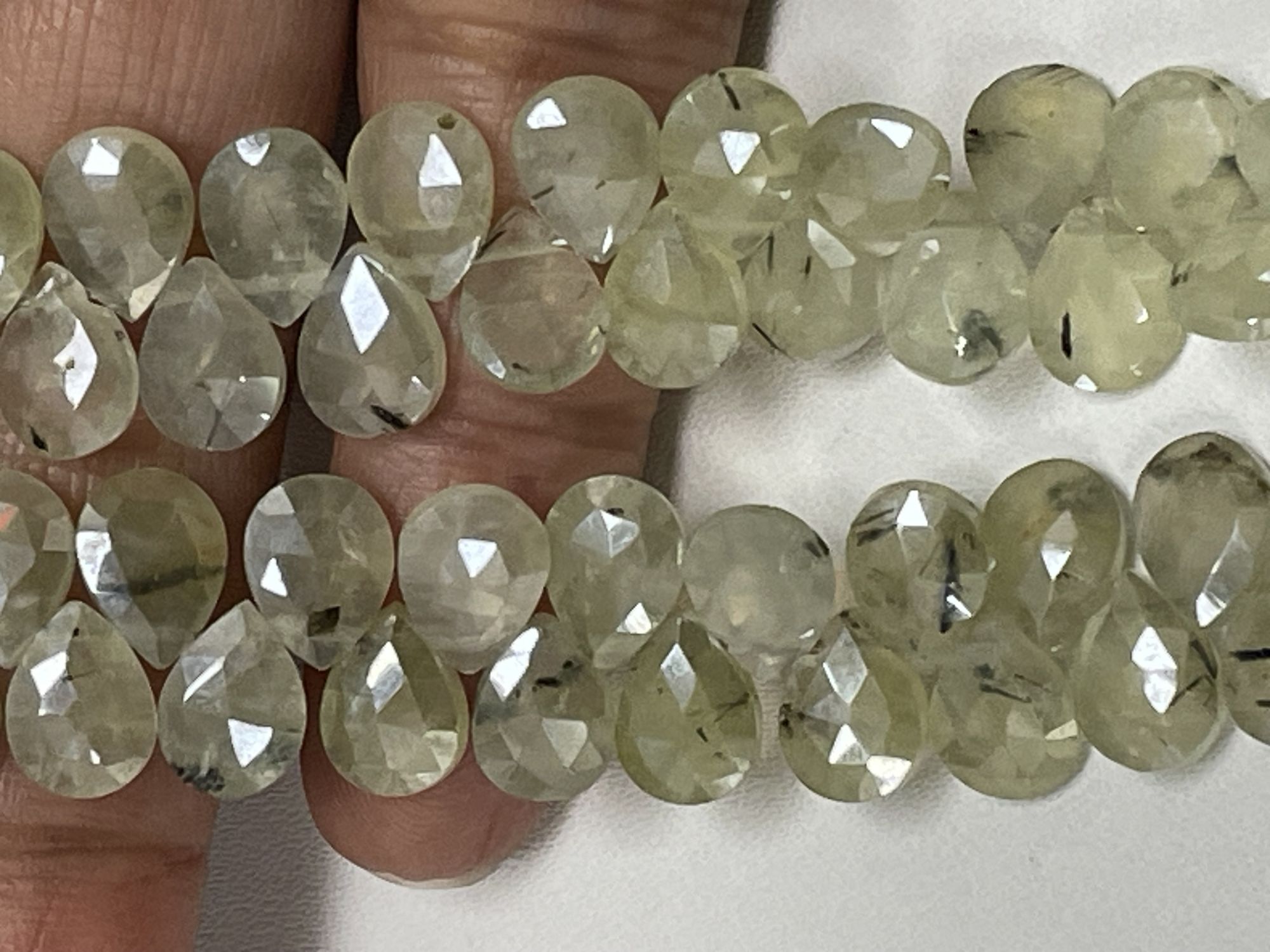Coated Prehnite Pear Faceted