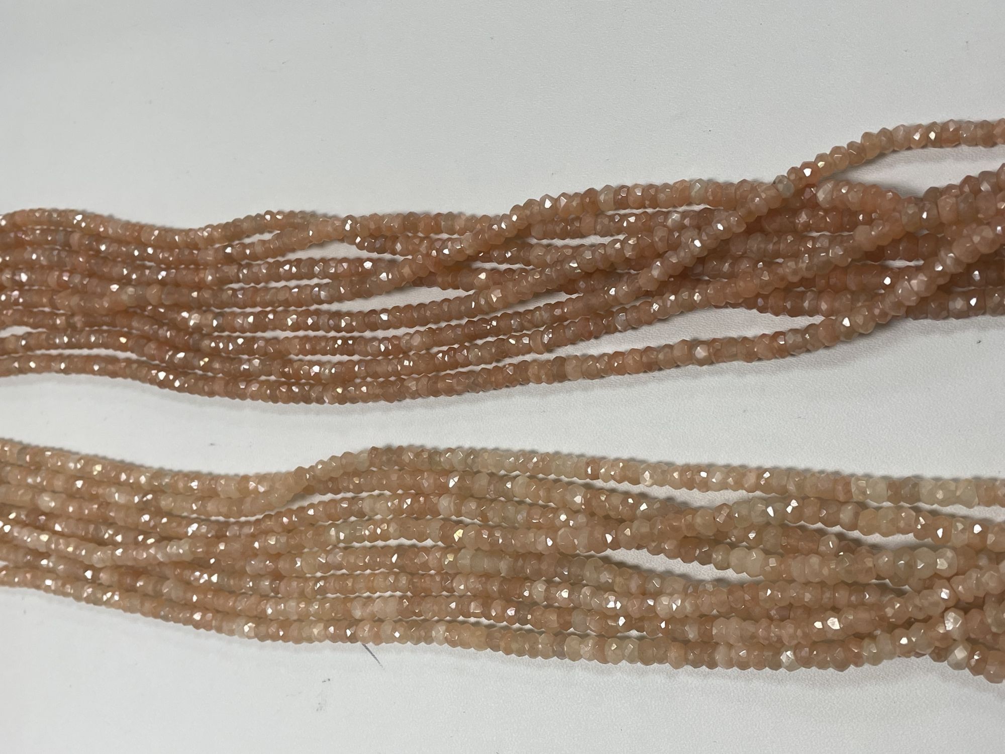 Coated Peach Moonstone Rondelle Fceted