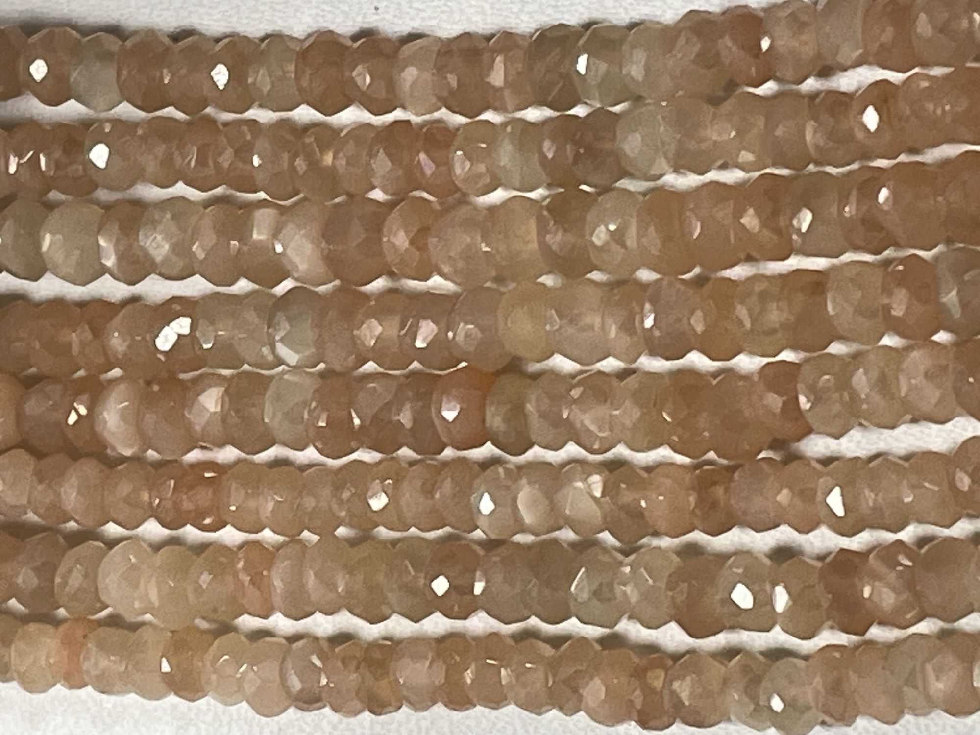 Coated Peach Moonstone Rondelle Fceted