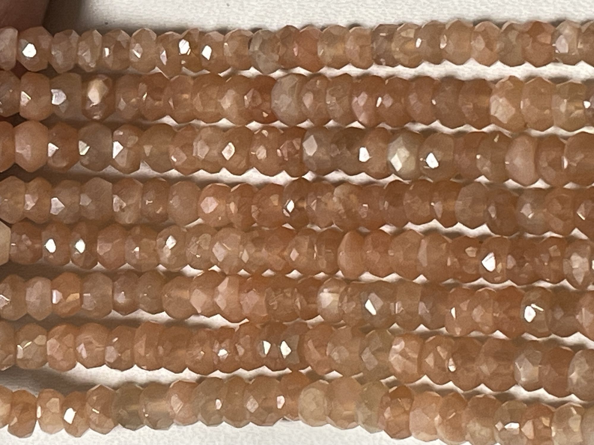 Coated Peach Moonstone Rondelle Fceted