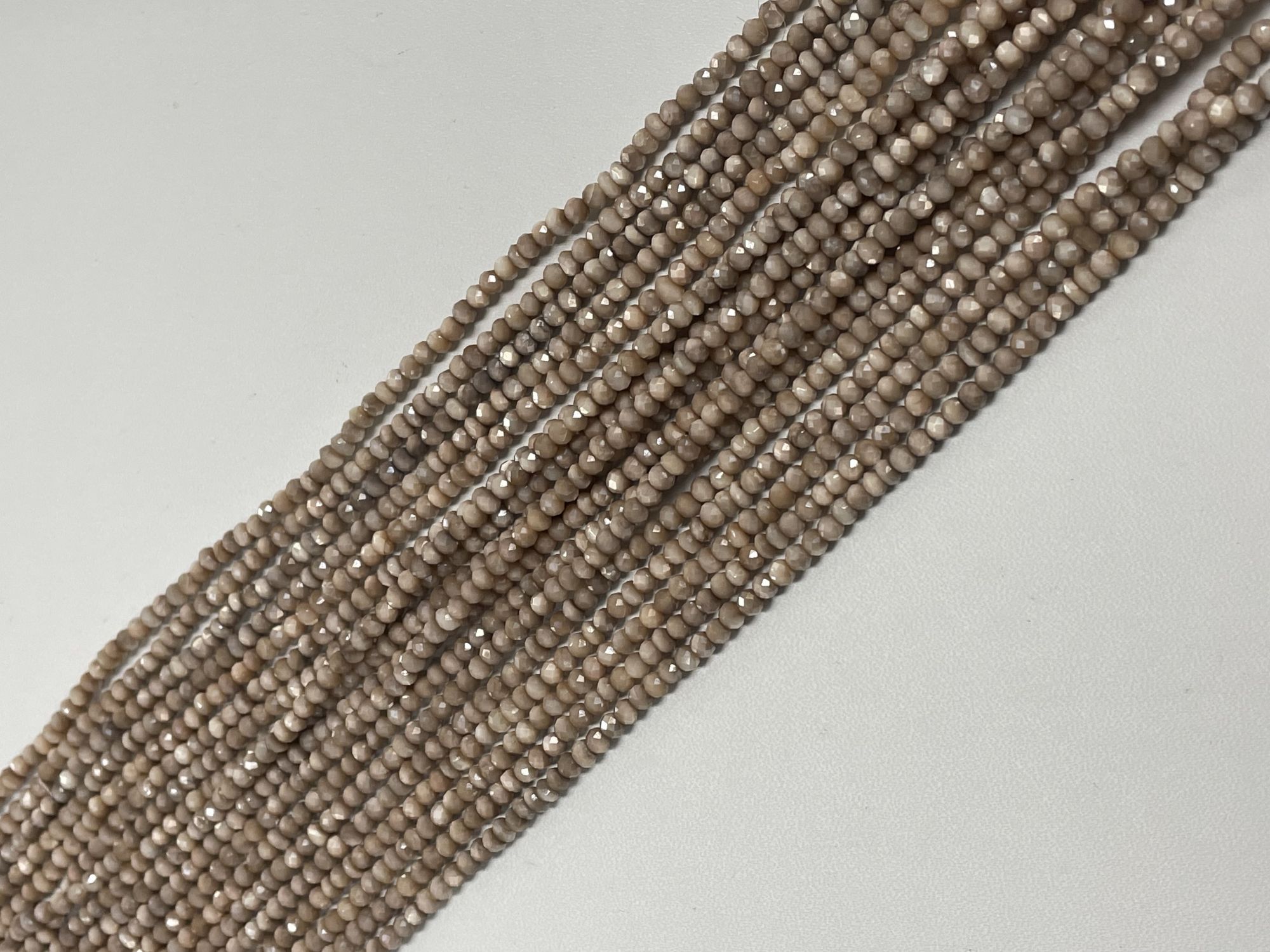 Coated Beige Moonstone Rondelle Faceted