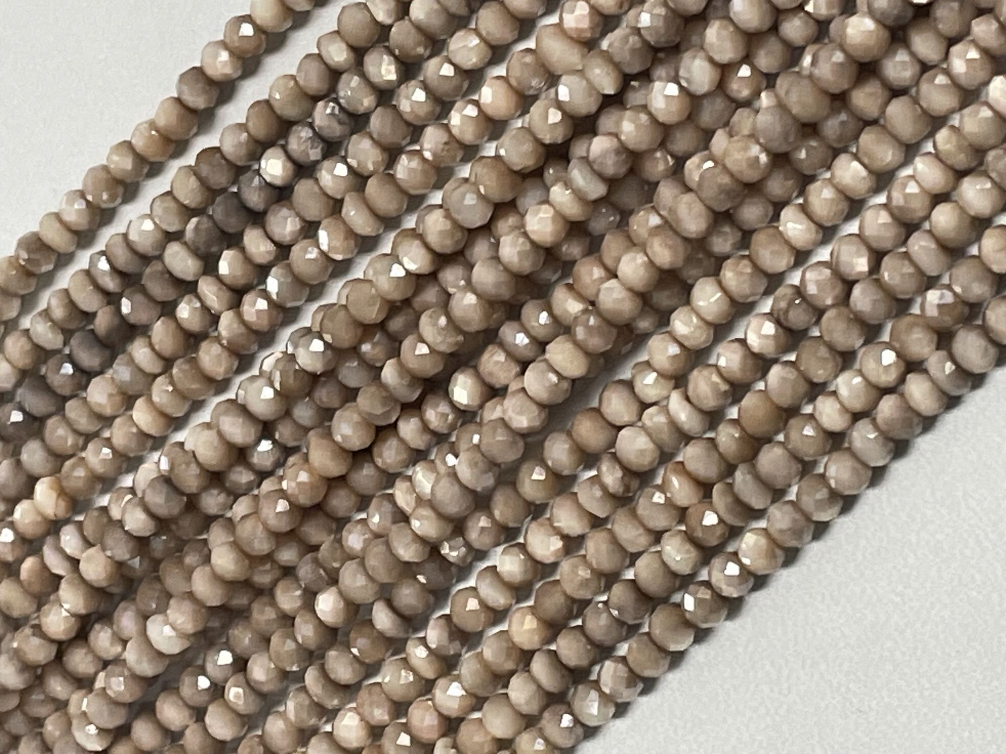 Coated Beige Moonstone Rondelle Faceted