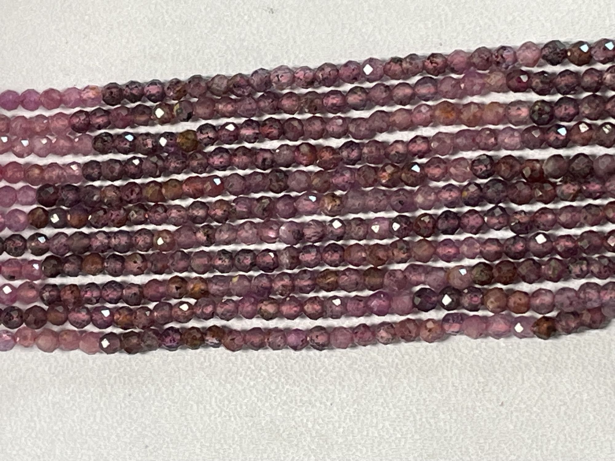 Shaded Ruby Rondelle Faceted