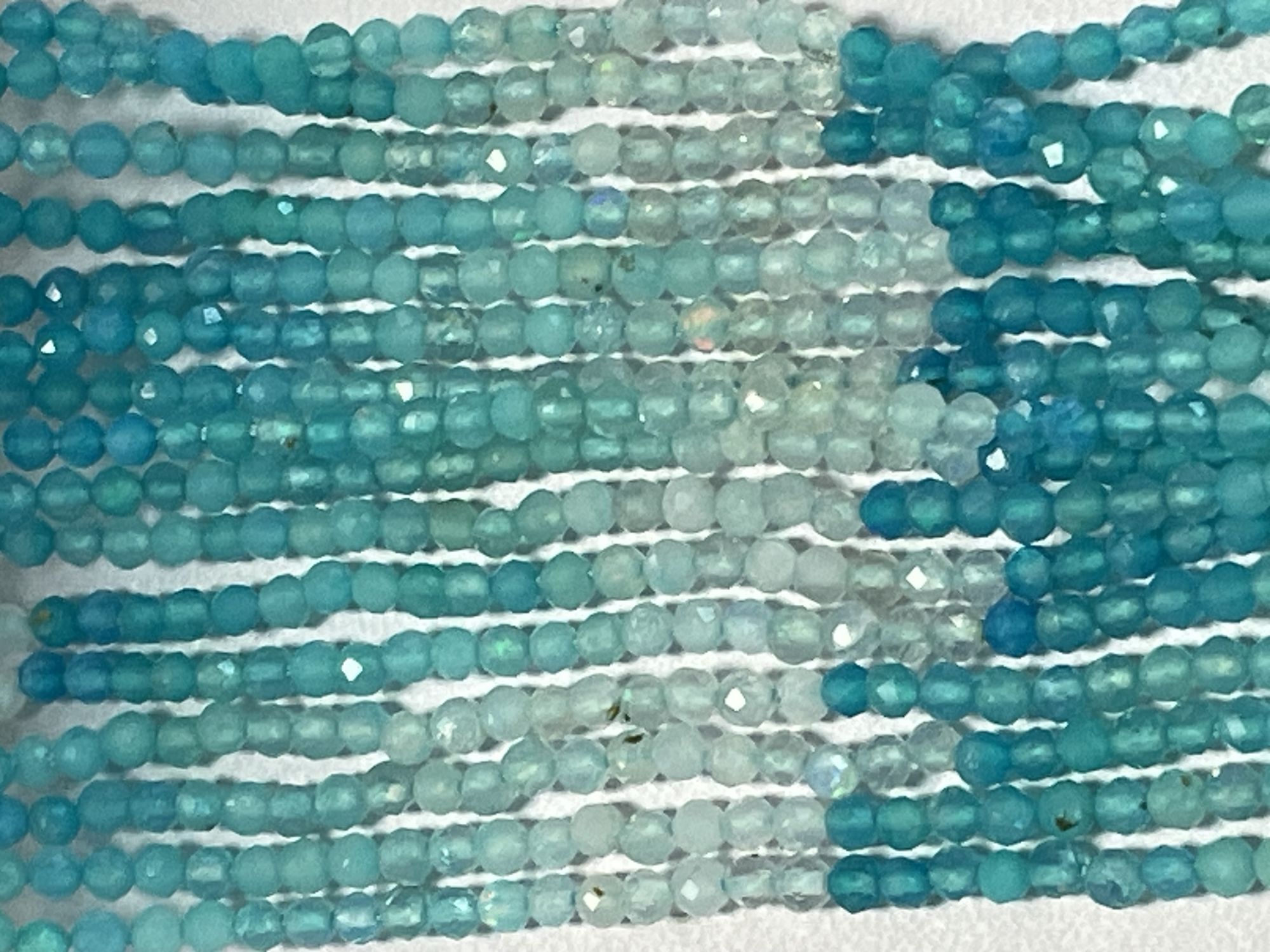 Shaded Blue Ethiopian Opal Rondelle Faceted