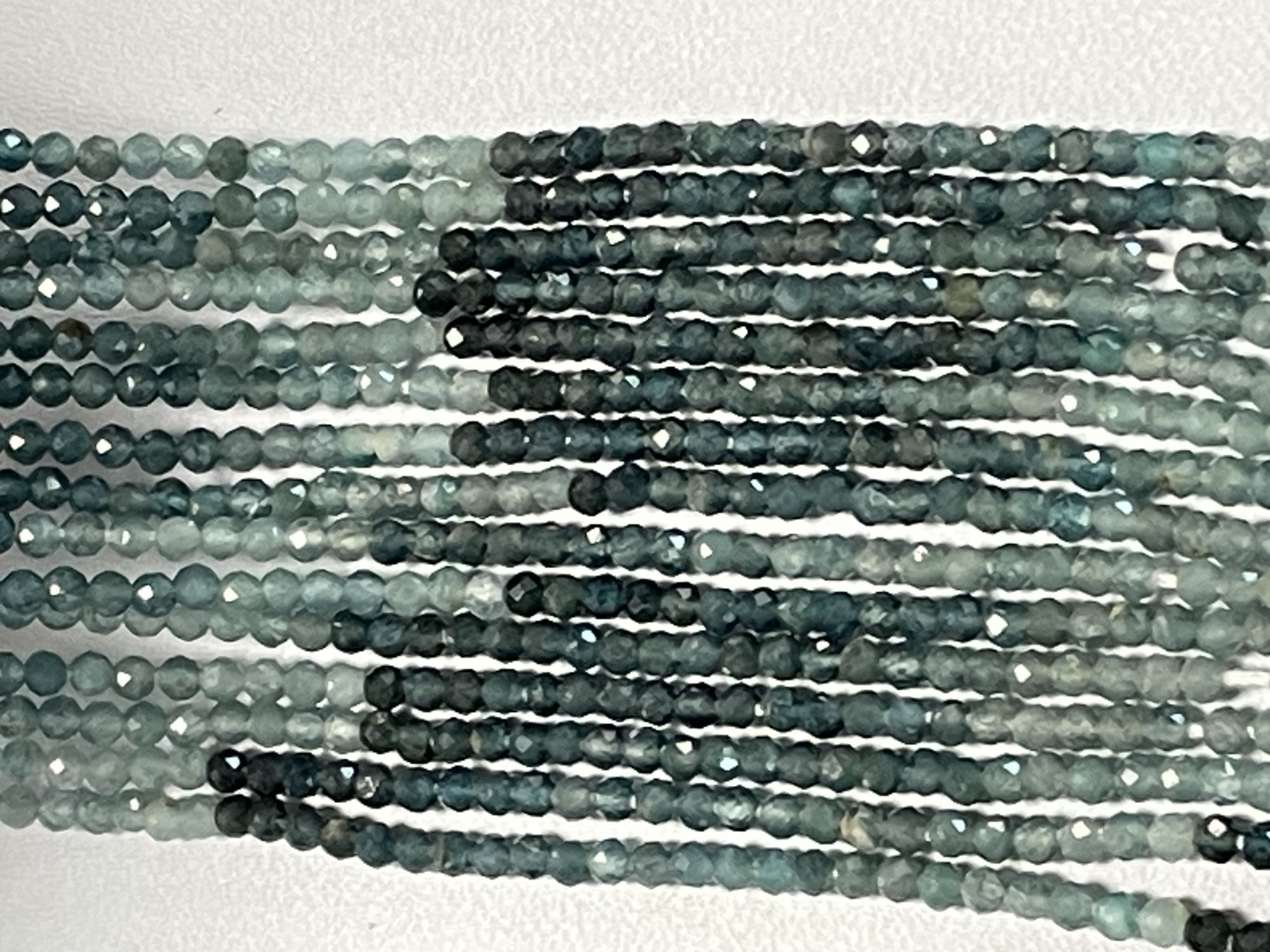 Shaded Blue sapphire Rondelle Faceted