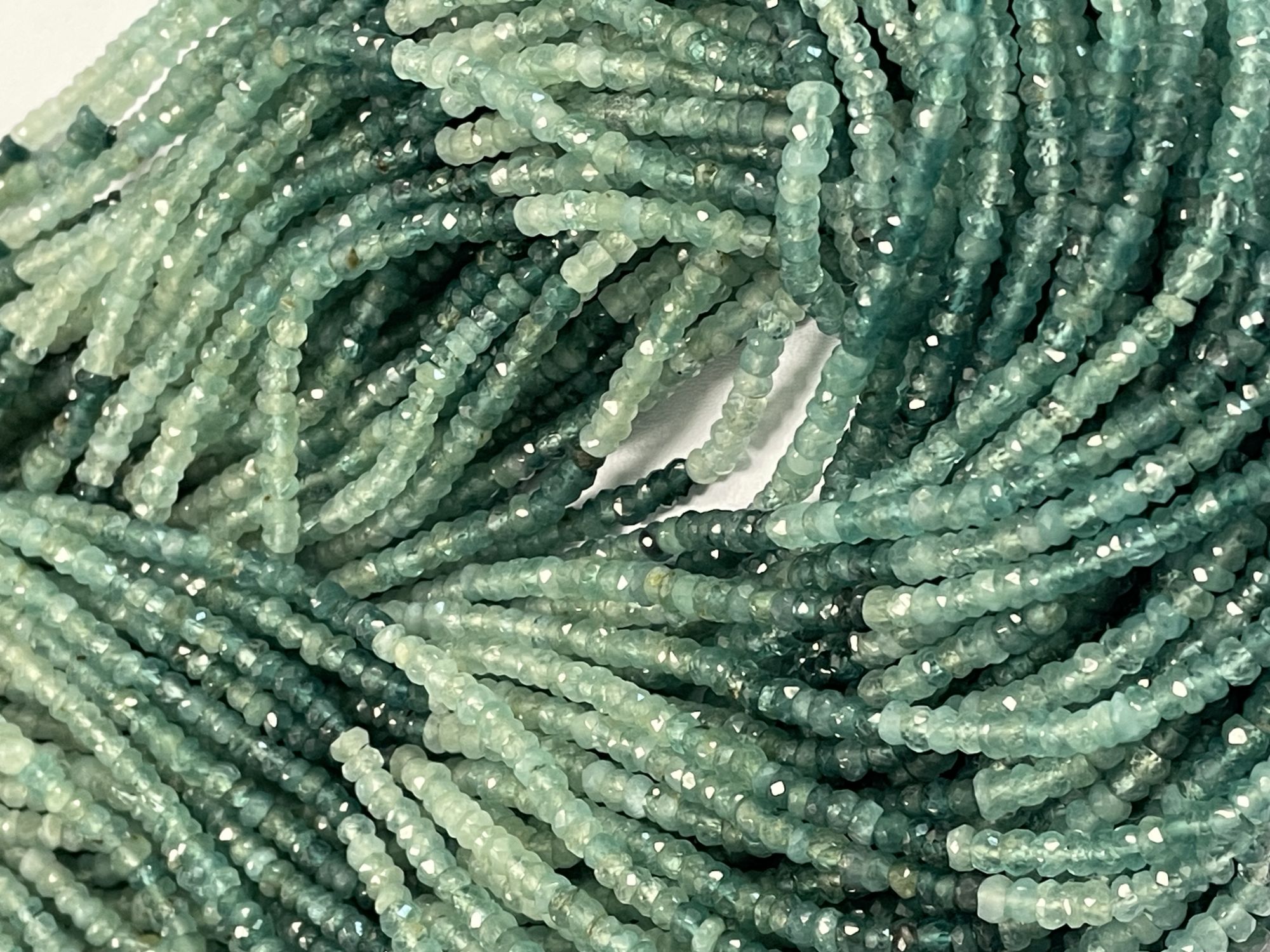 Shaded Grandidierite Rondelle Faceted