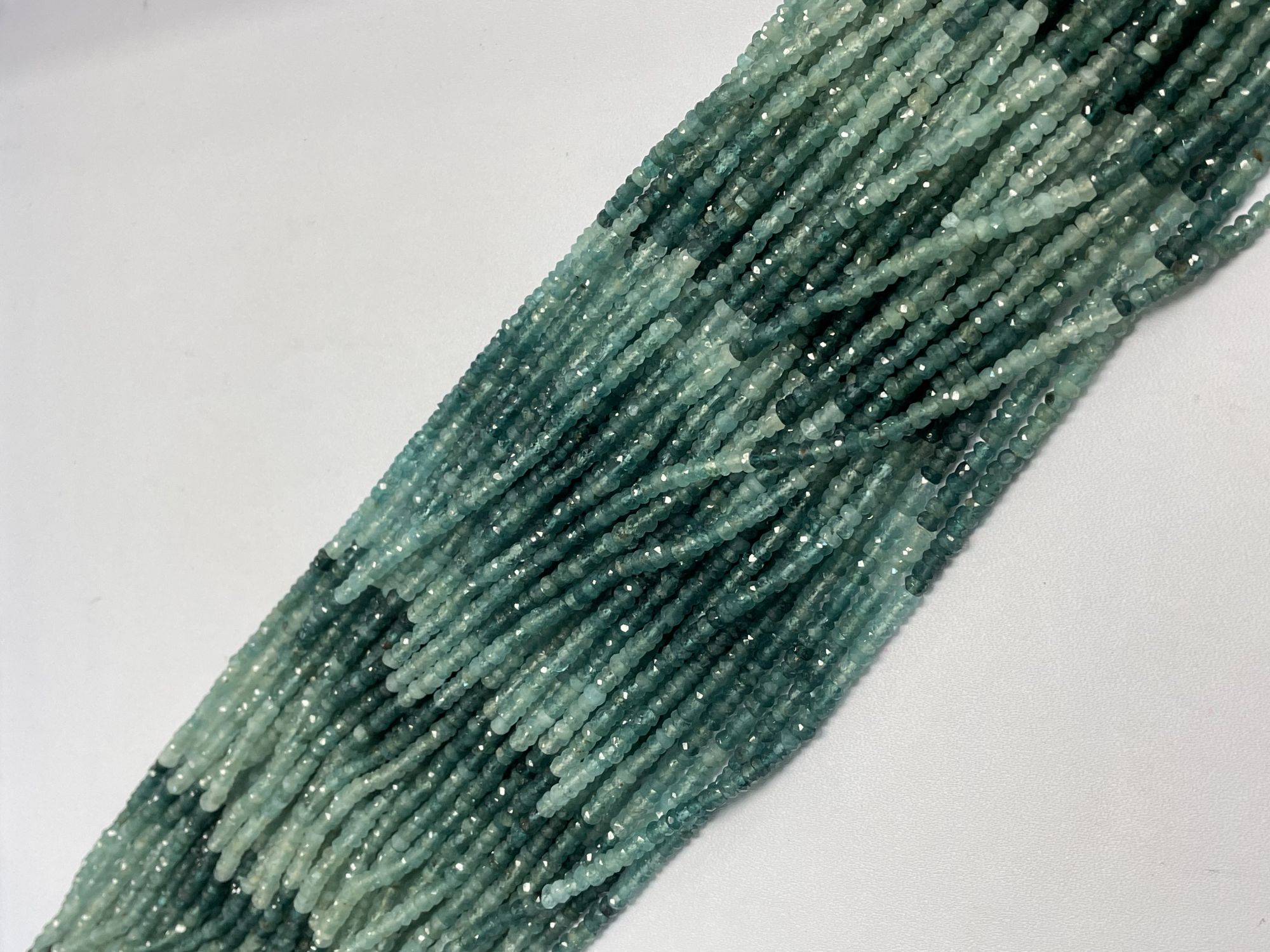 Shaded Grandidierite Rondelle Faceted