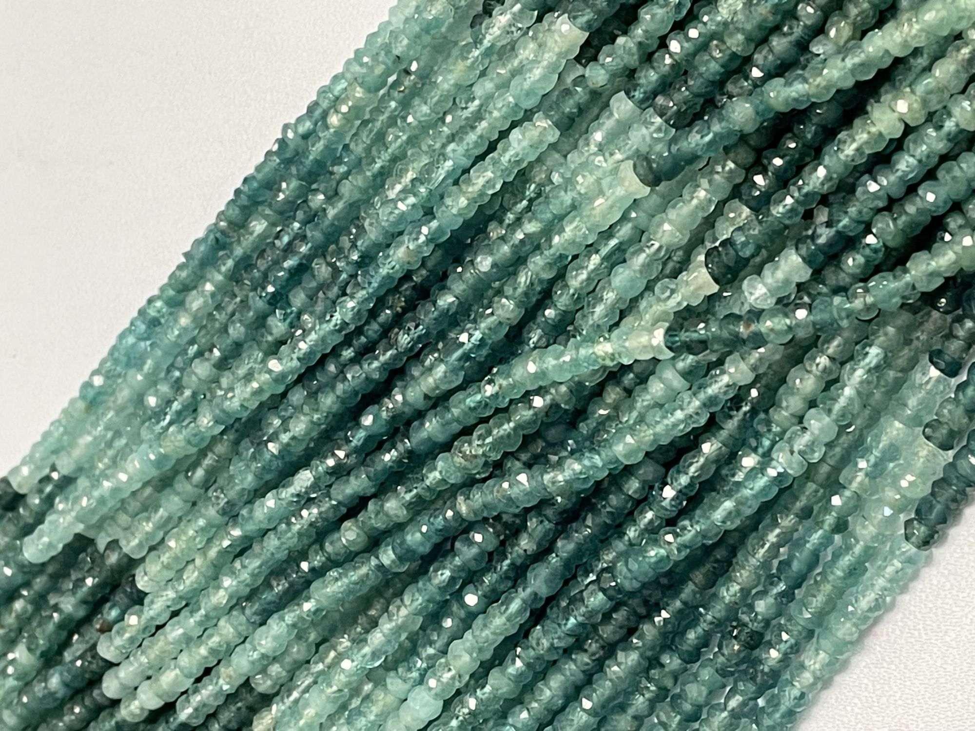 Shaded Grandidierite Rondelle Faceted