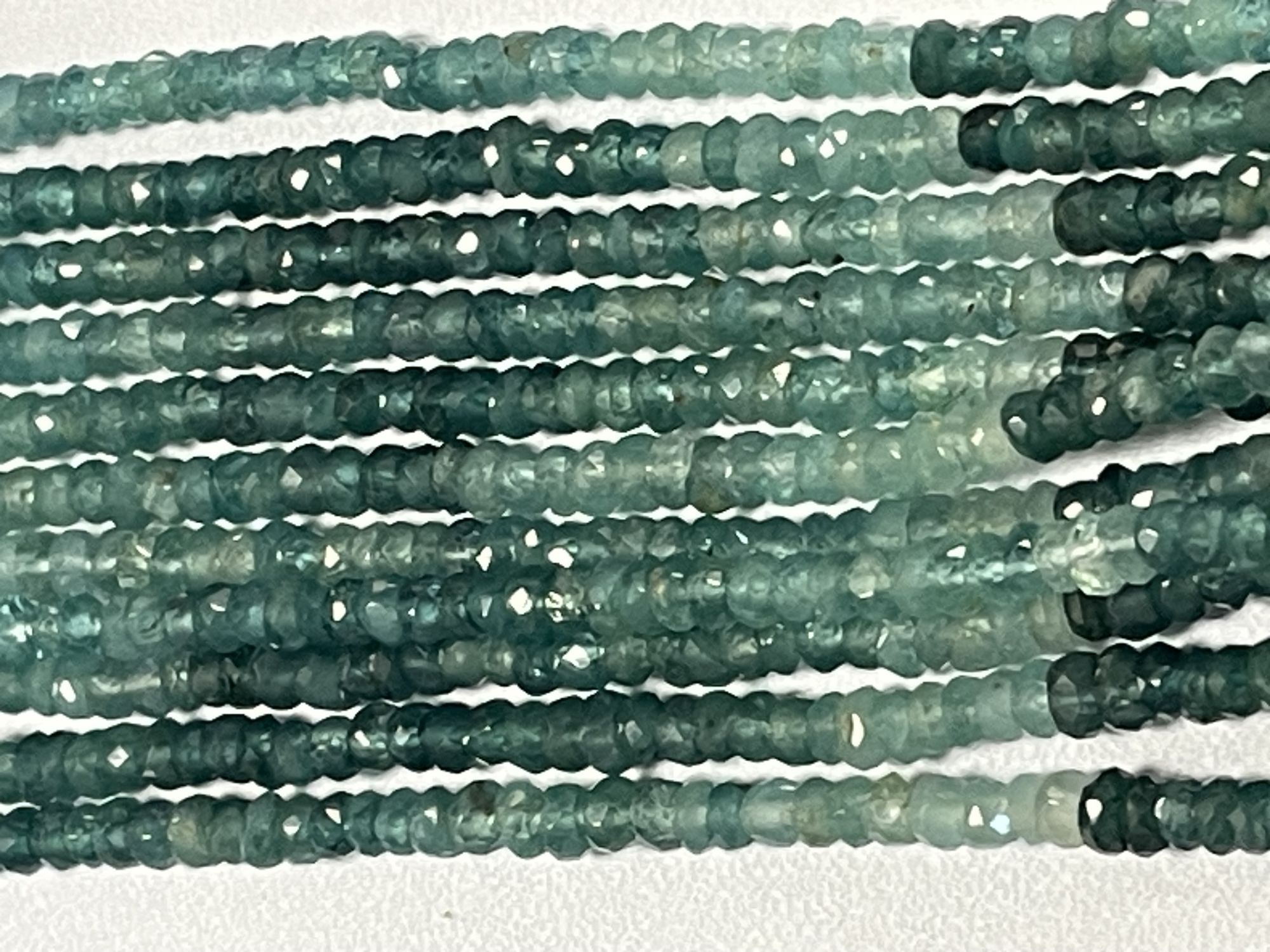 Shaded Grandidierite Rondelle Faceted