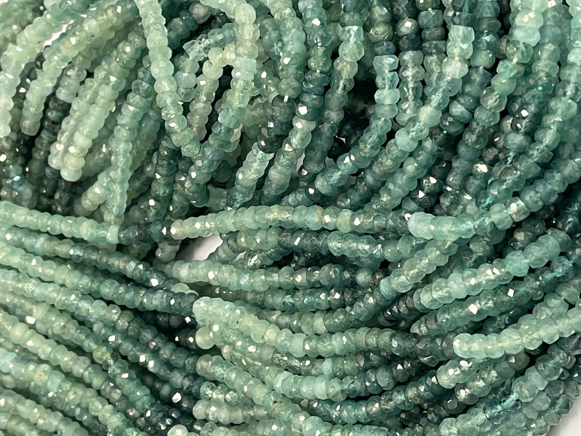 Shaded Grandidierite Rondelle Faceted