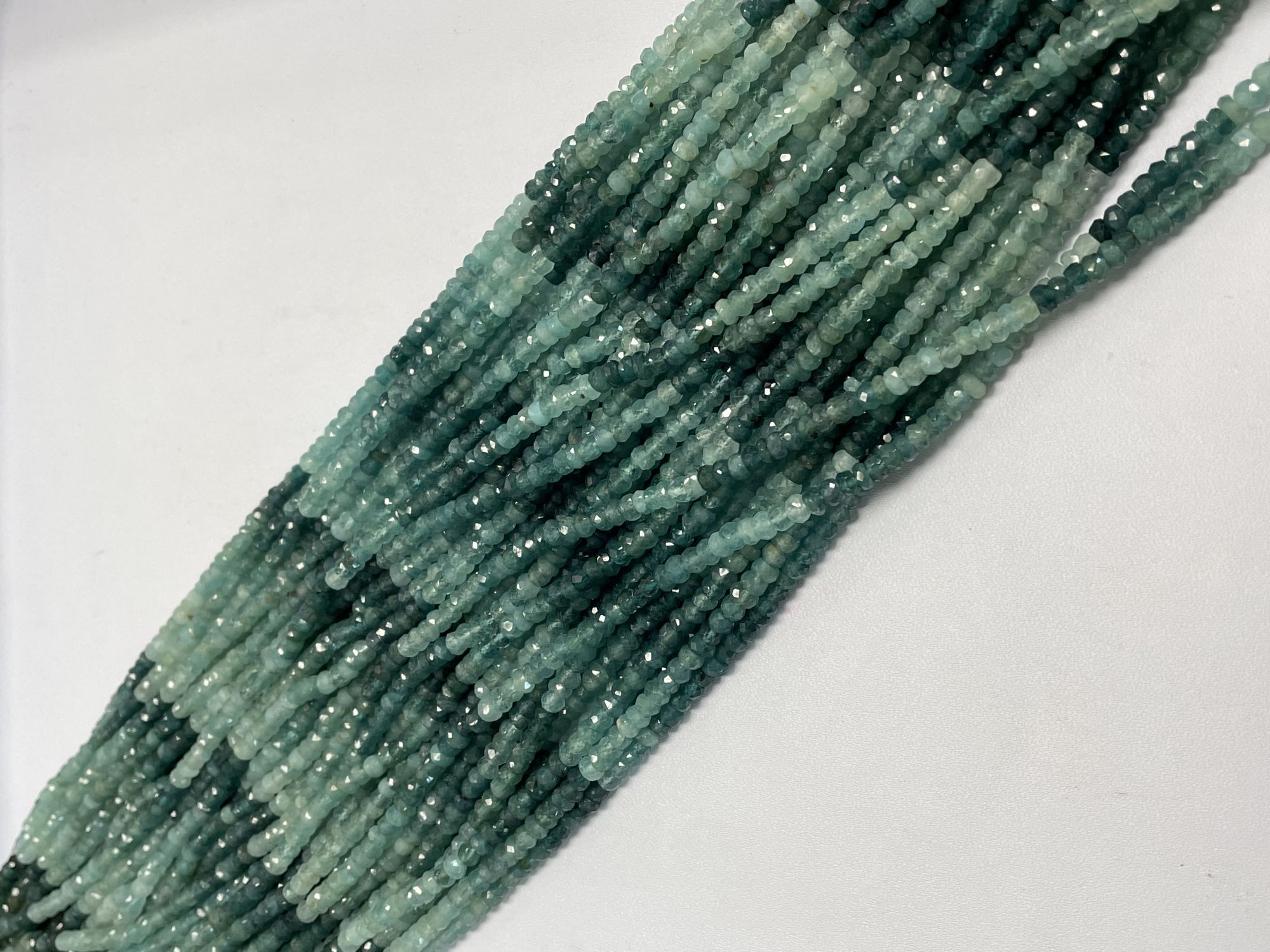 Shaded Grandidierite Rondelle Faceted