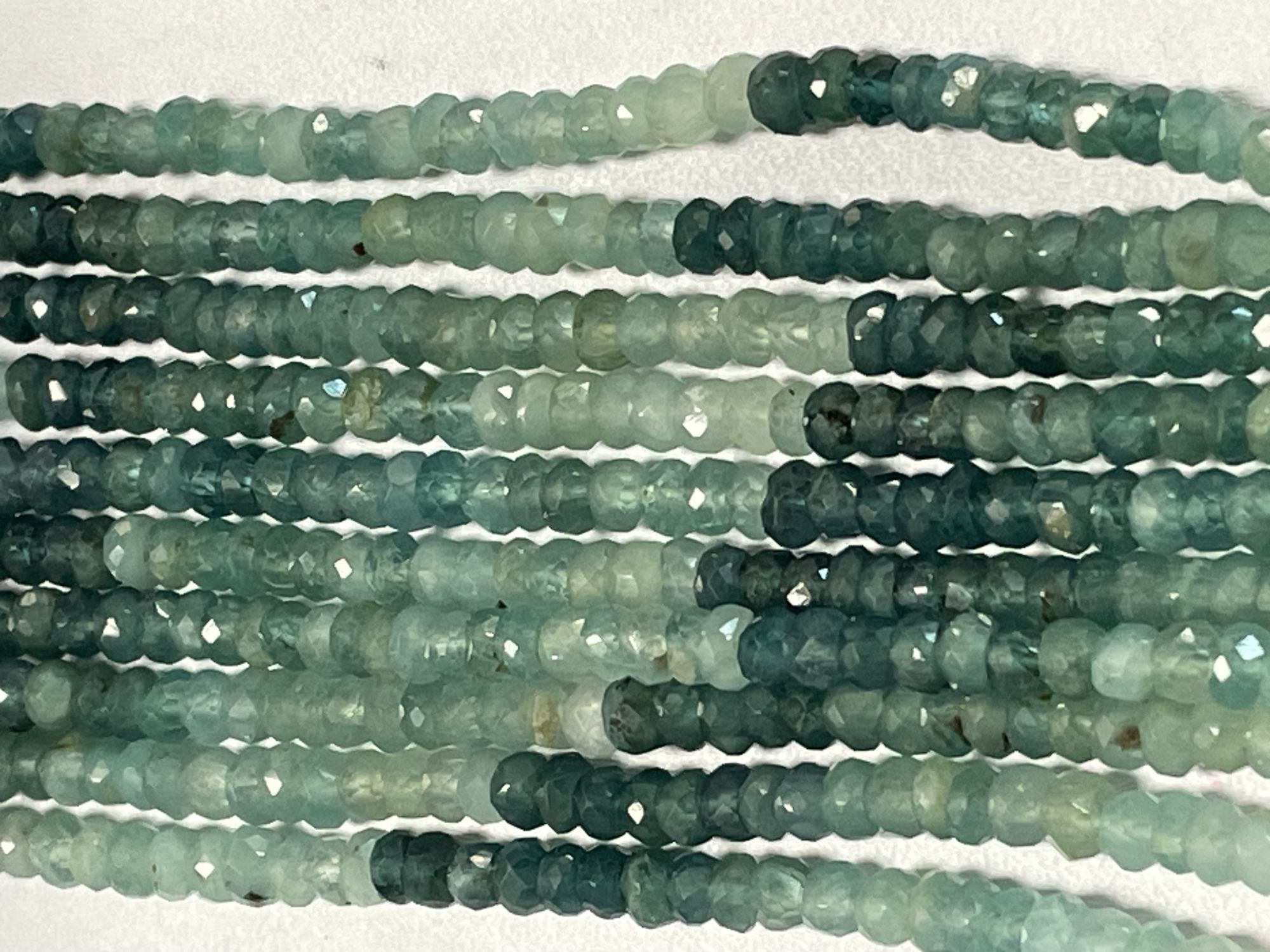 Shaded Grandidierite Rondelle Faceted