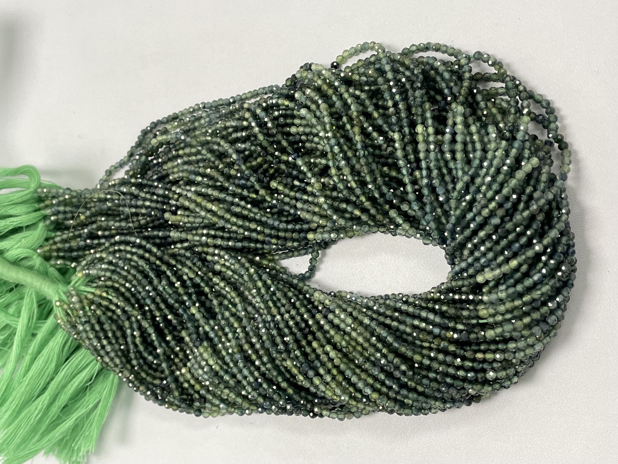 Shaded Green Sapphire Rondelle Faceted