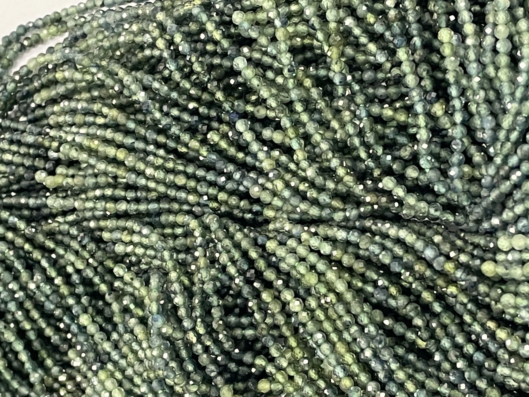 Shaded Green Sapphire Rondelle Faceted