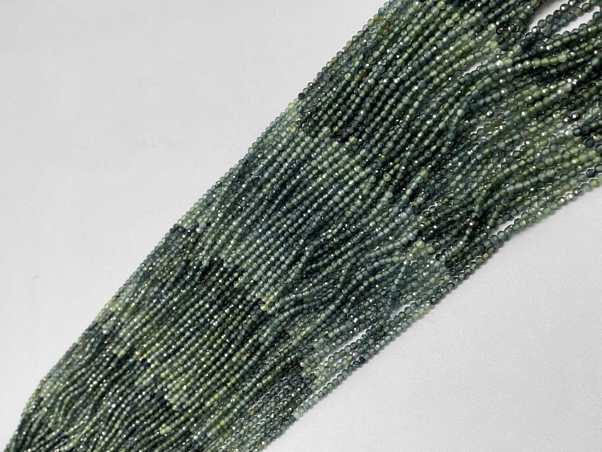 Shaded Green Sapphire Rondelle Faceted