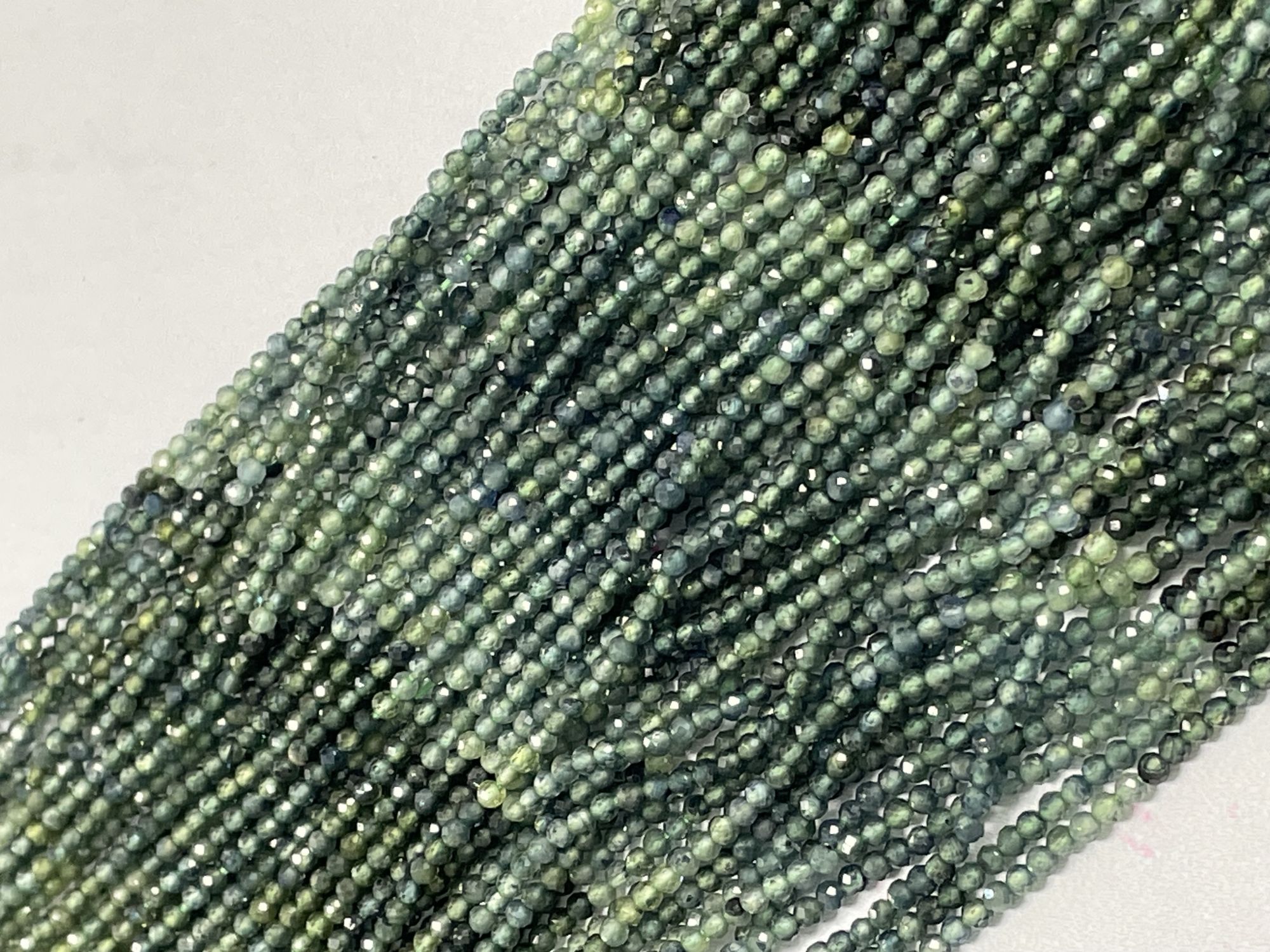 Shaded Green Sapphire Rondelle Faceted