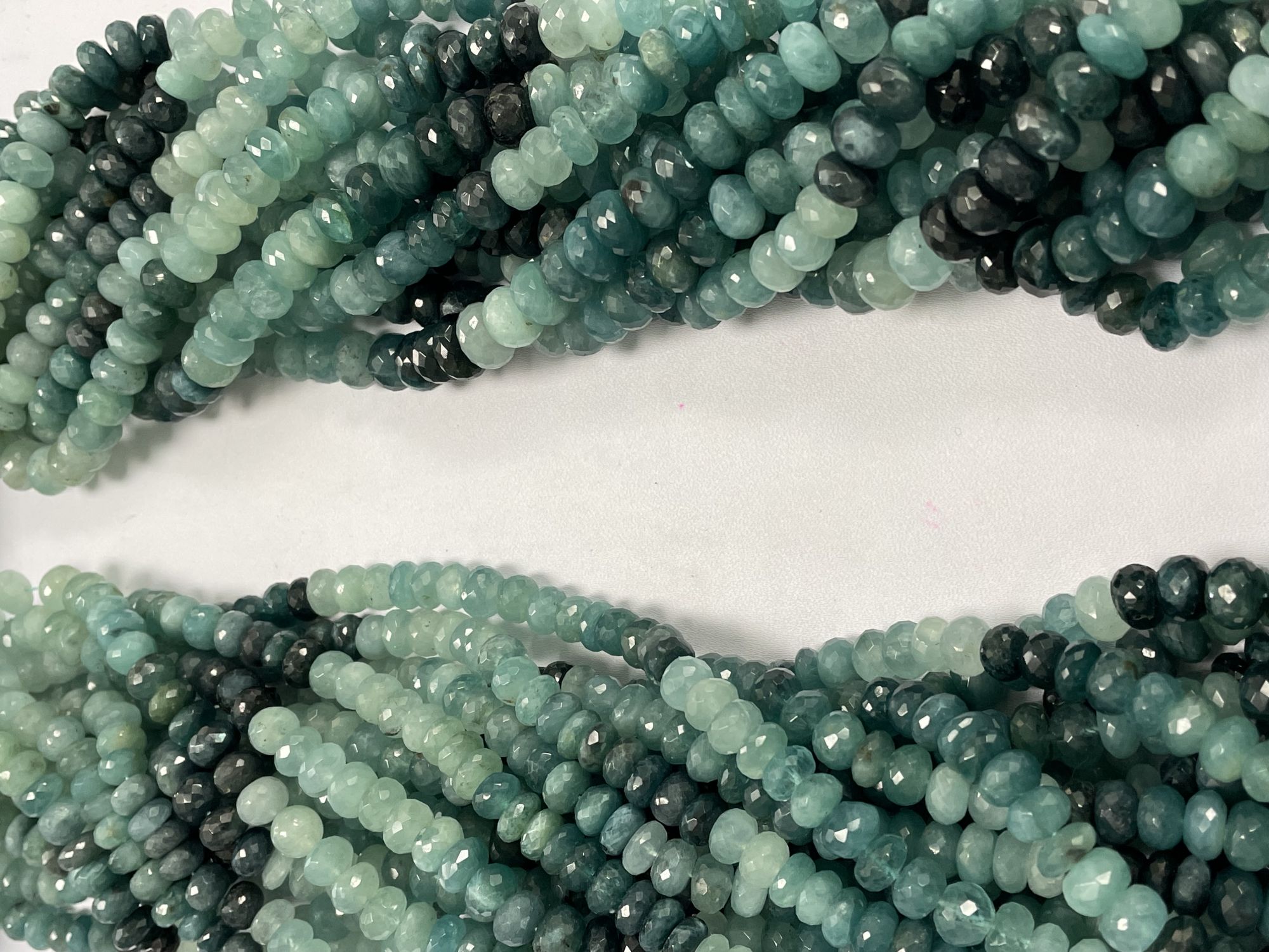 Shaded Grandidierite Rondelle Faceted