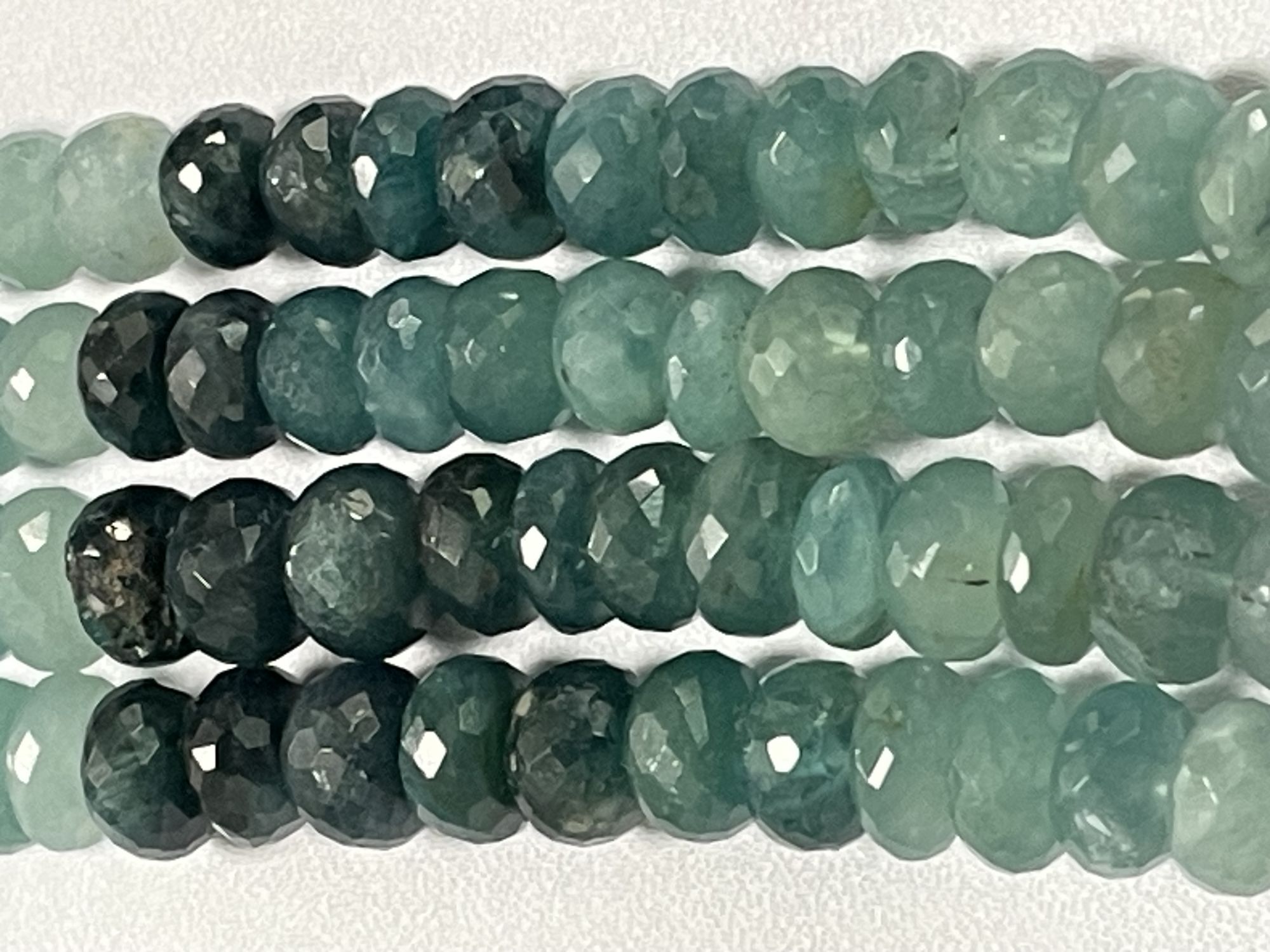 Shaded Grandidierite Rondelle Faceted