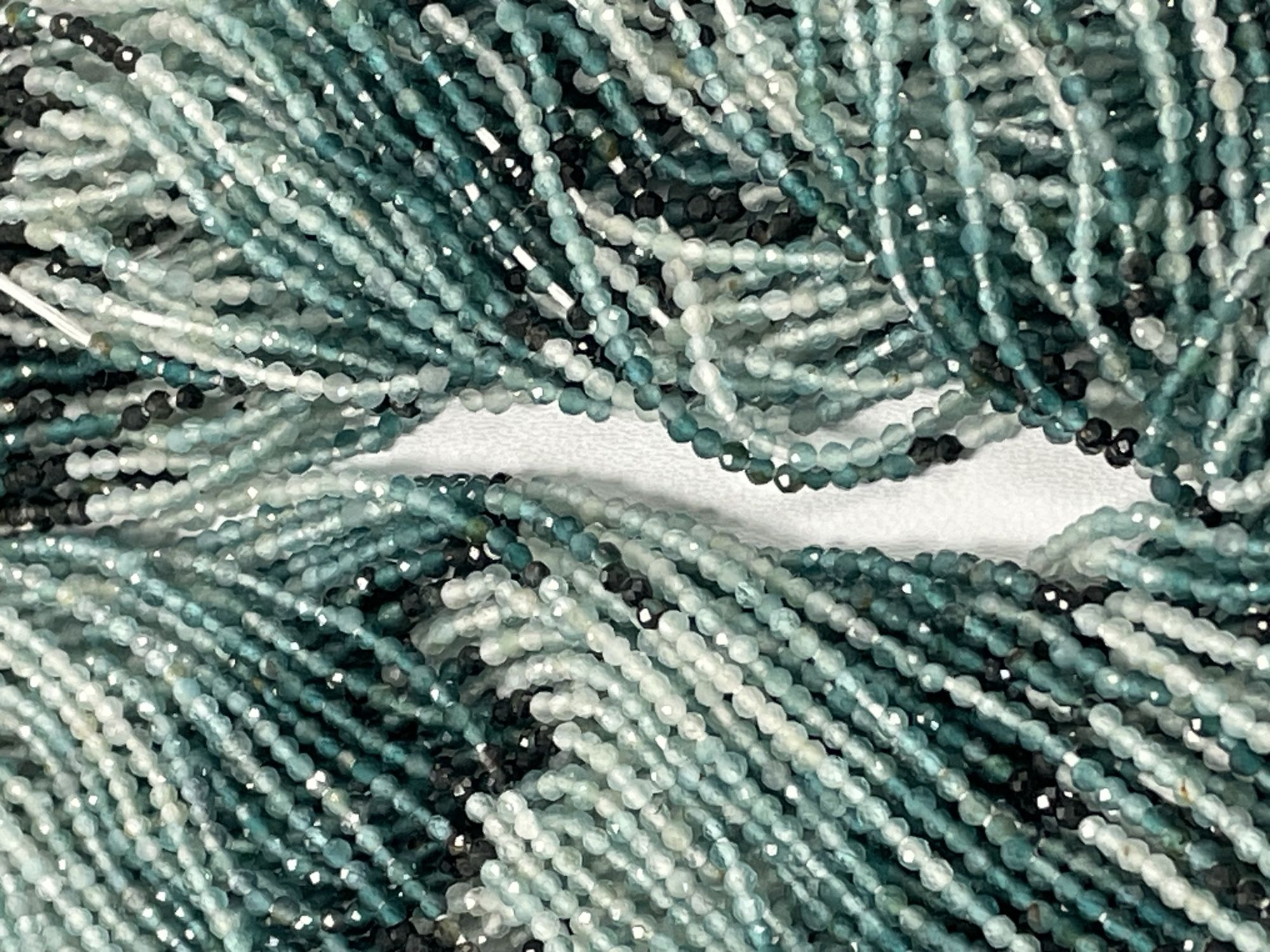 Shaded Blue Grandidierite Rondelle Faceted