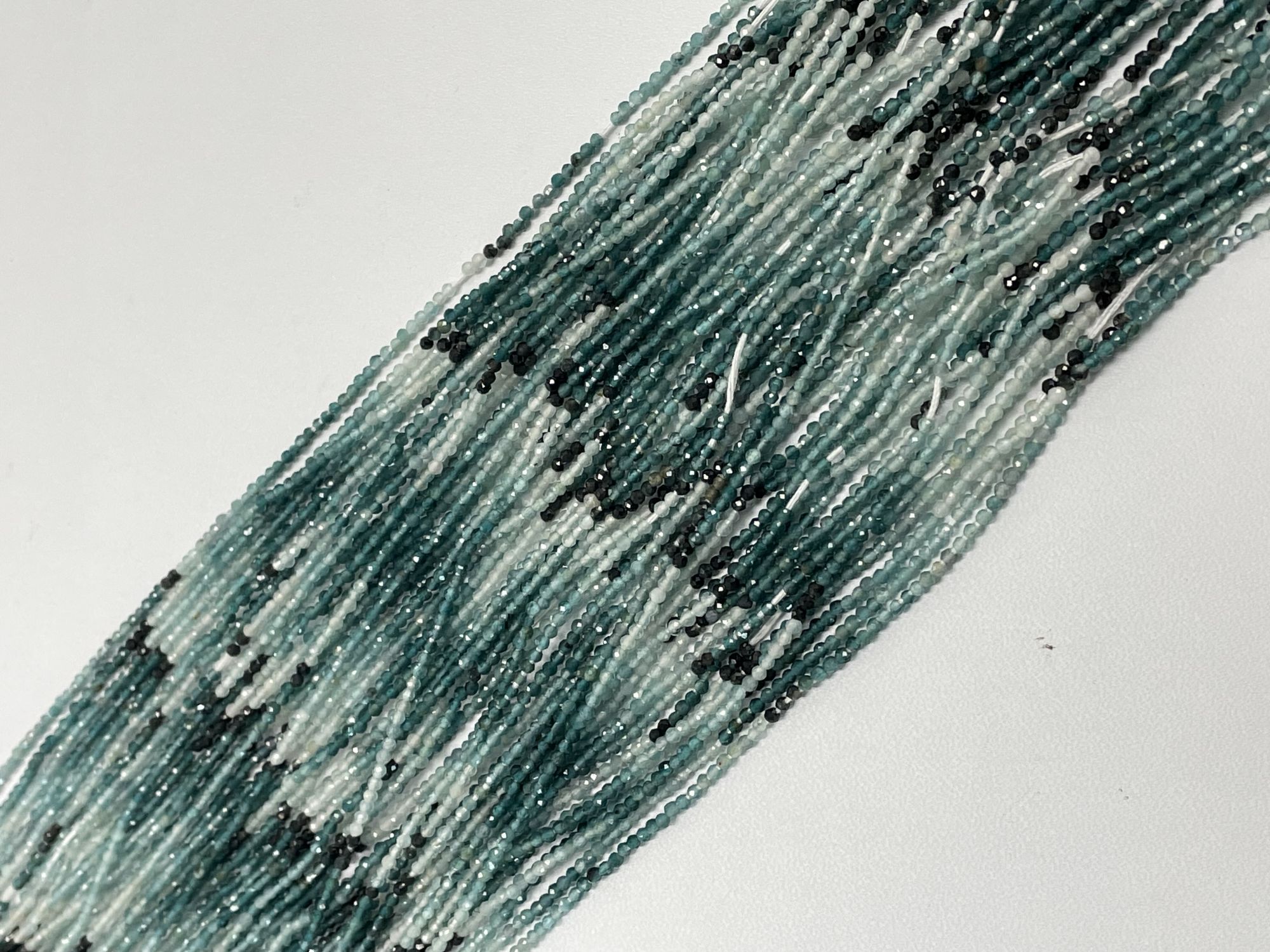 Shaded Blue Grandidierite Rondelle Faceted