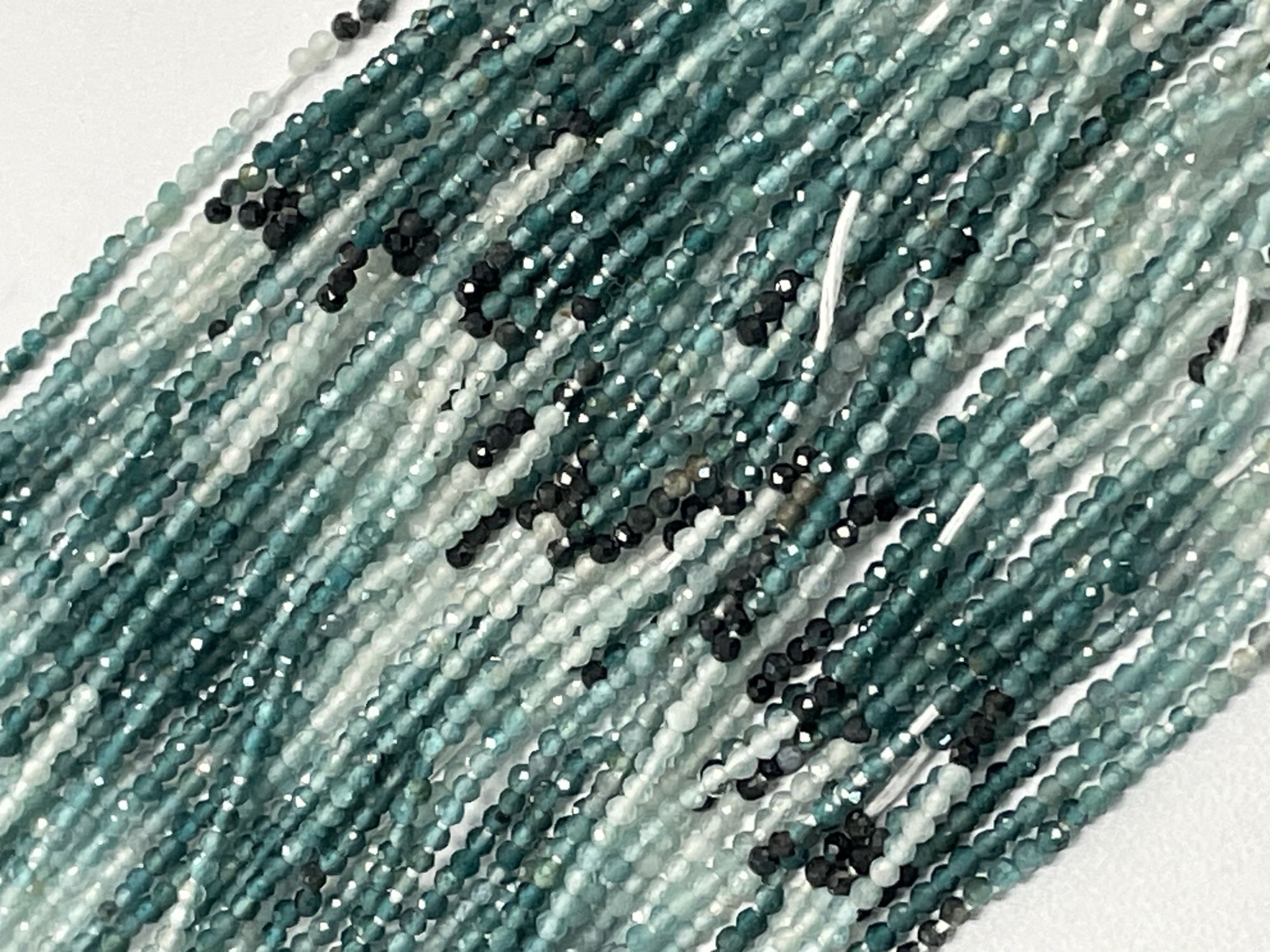 Shaded Blue Grandidierite Rondelle Faceted