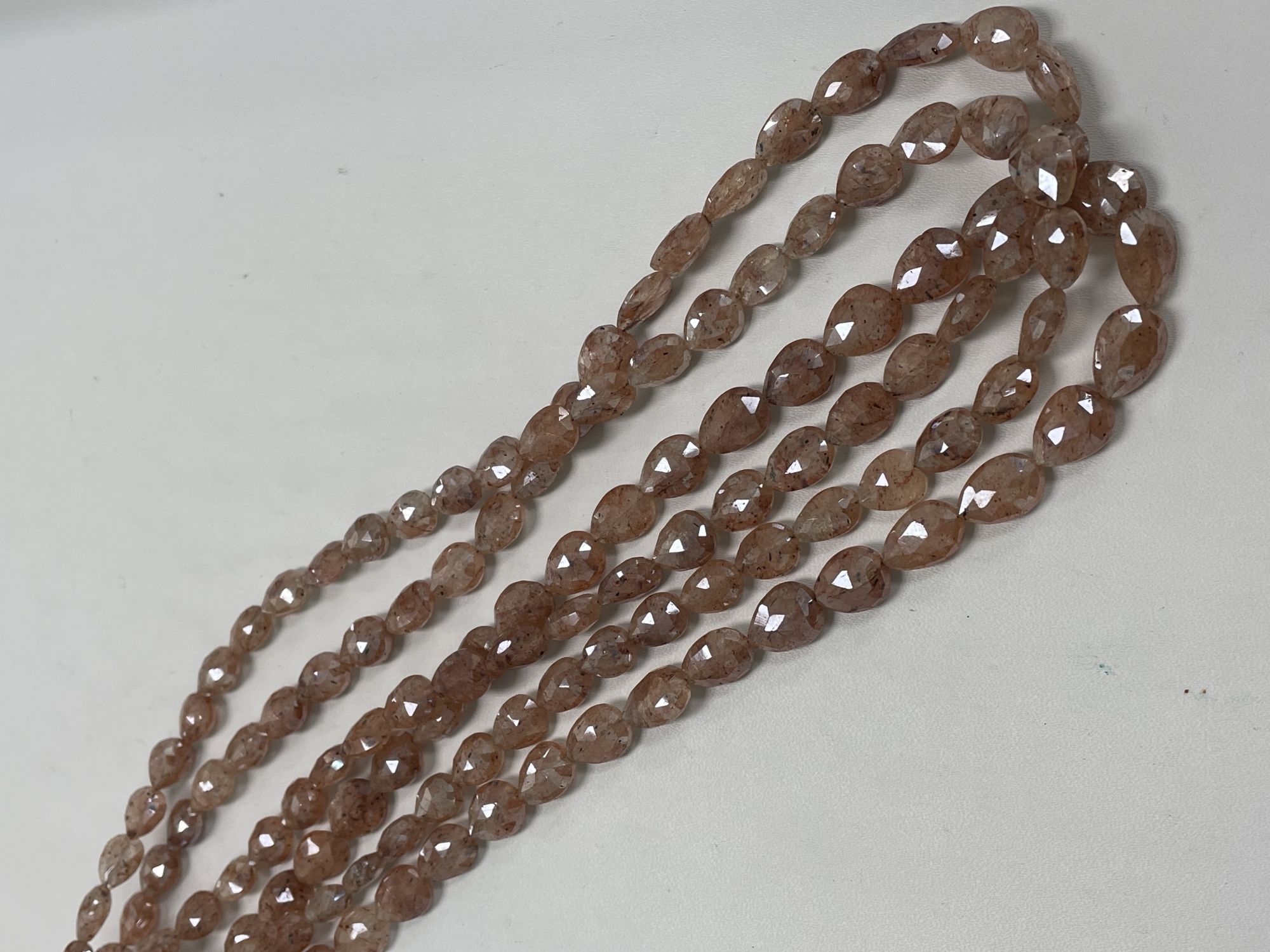 Coated Brown Silverite Pear Faceted