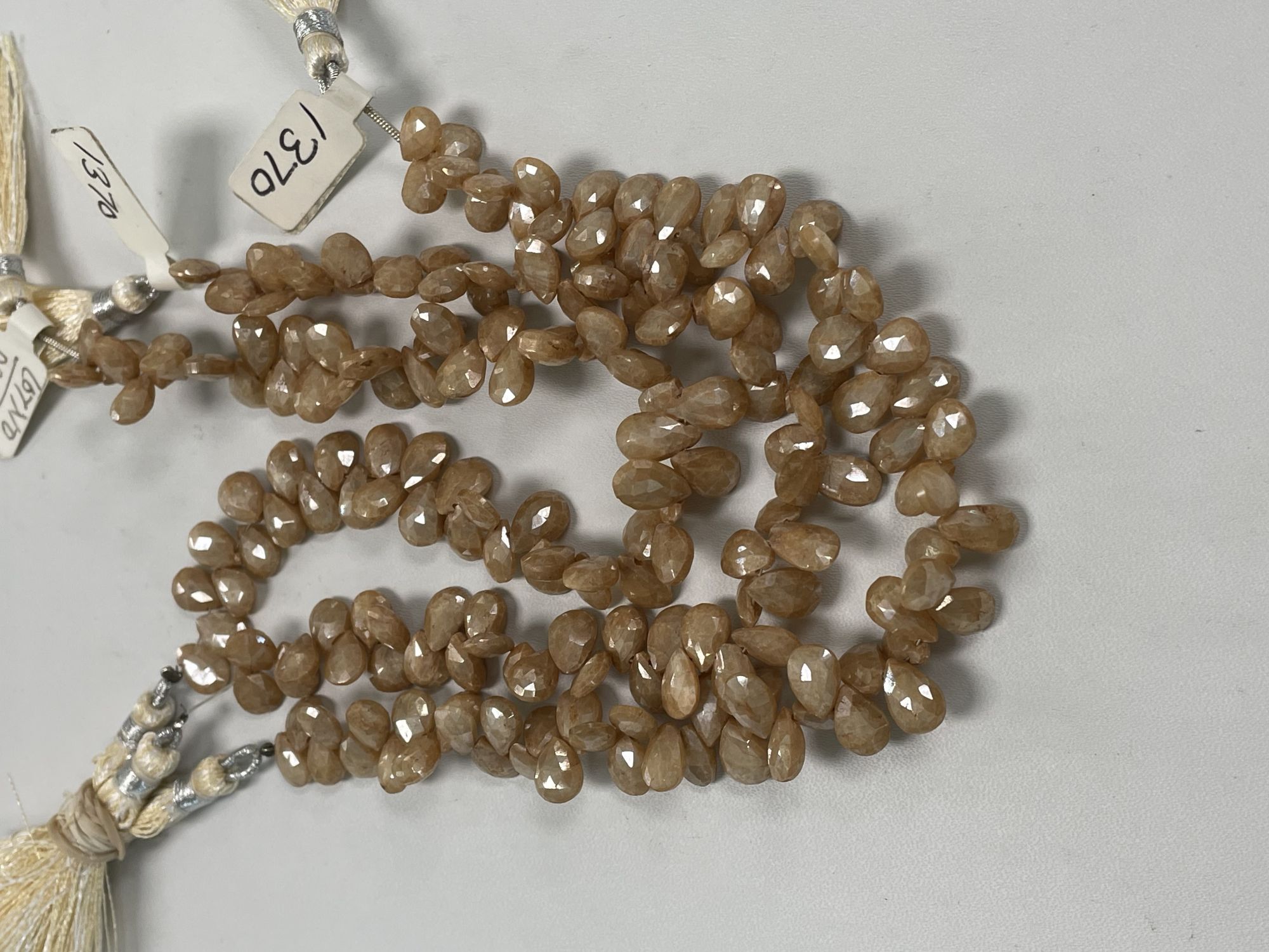 Coated Beige Silverite Pear Faceted